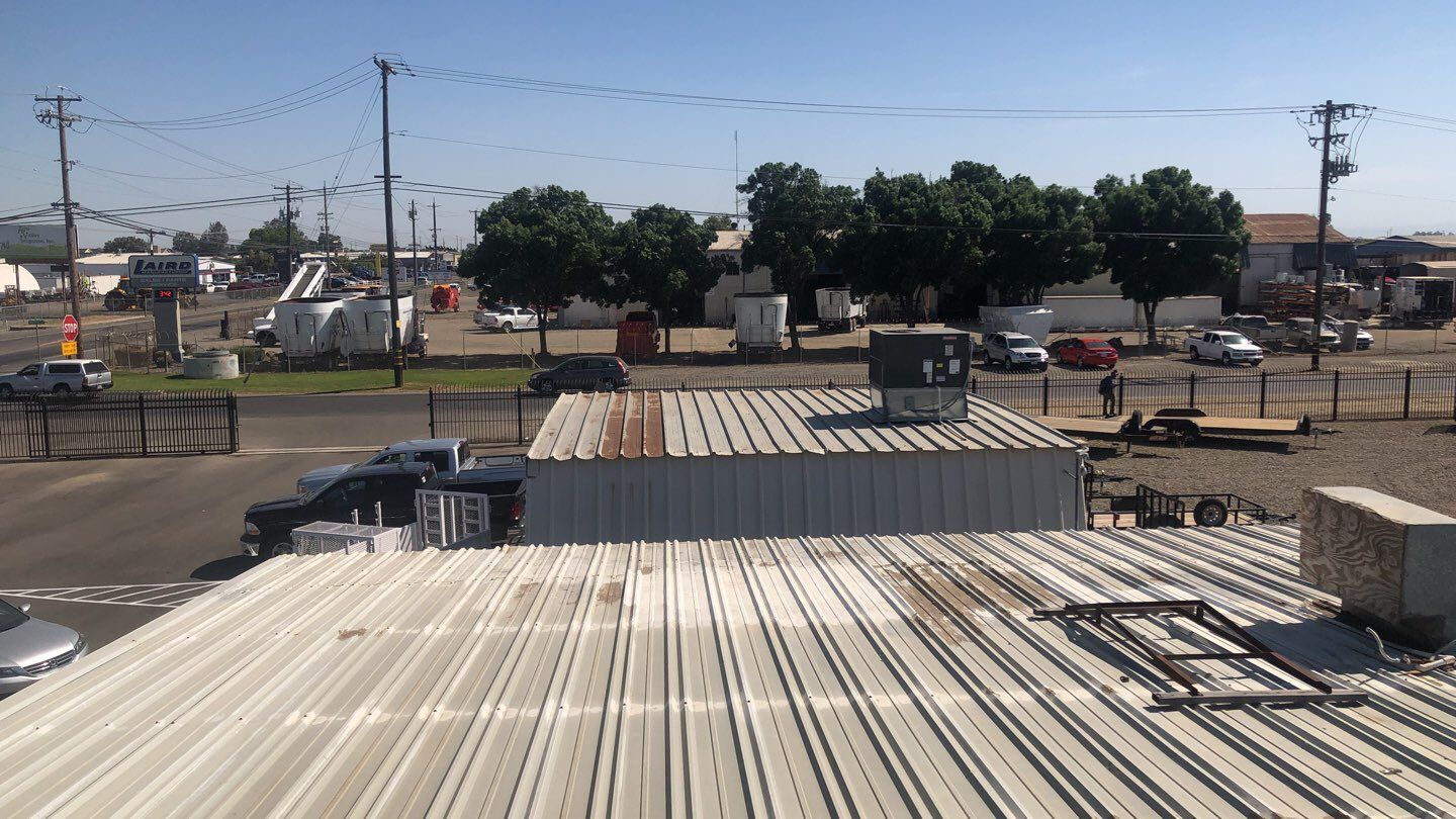 Metal Restoration Roofing system with Benchmark/PUMA XL 20 yr warranty by Straight Edge Roofing Inc