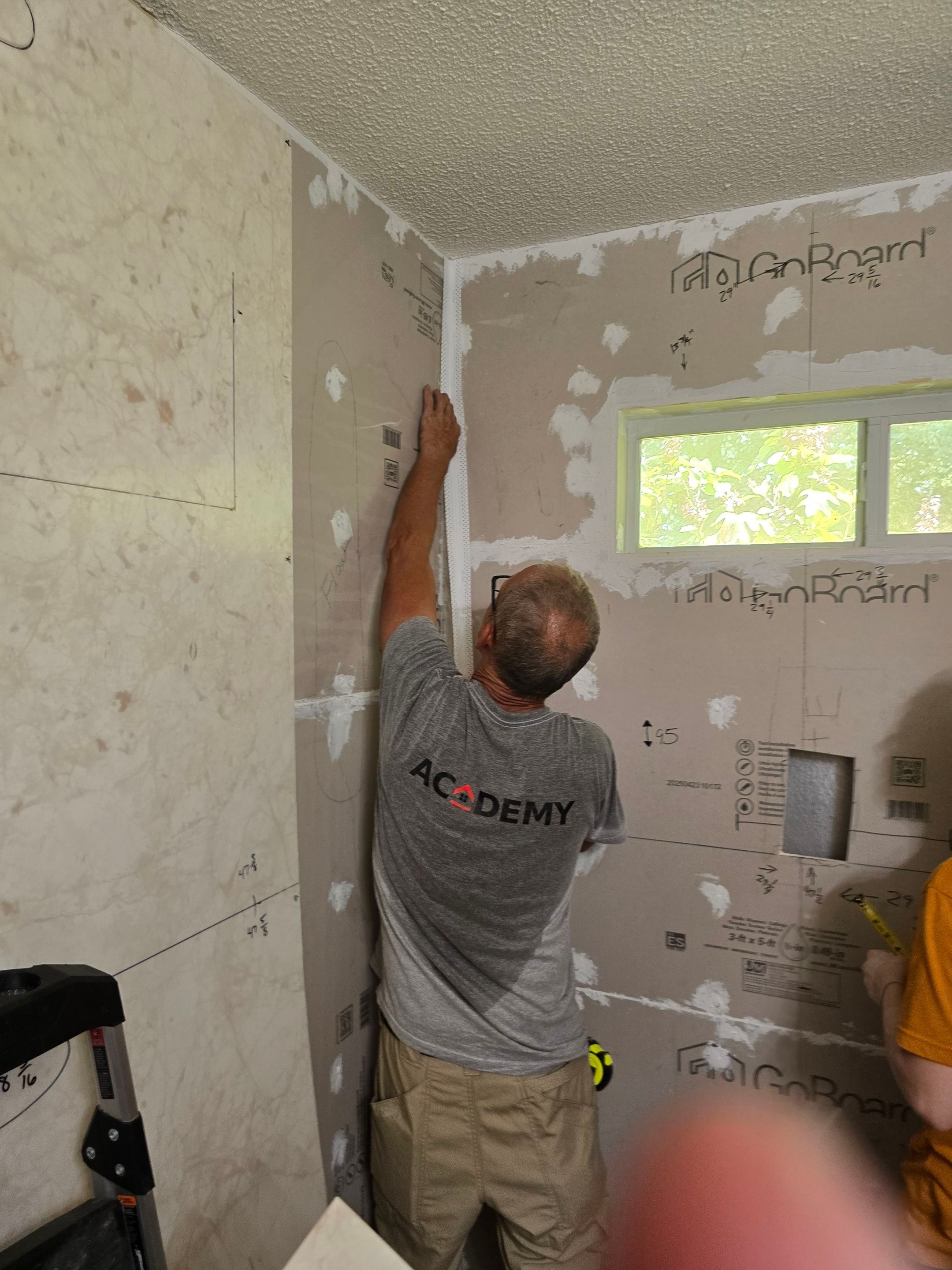 Sentrel Shower with window and ADA chair / ADA grab bar by Academy Construction