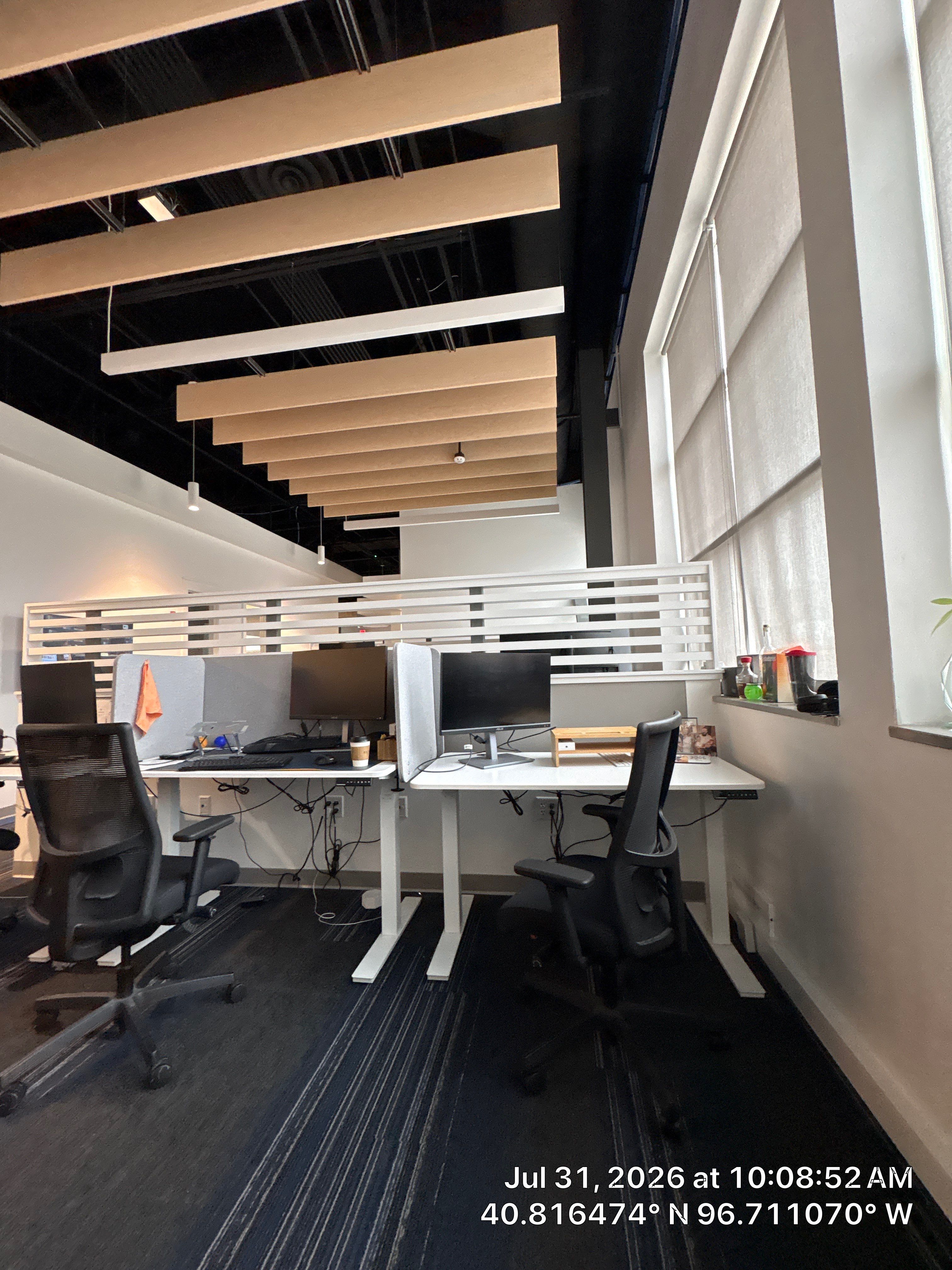Modern Commercial Office Fit-Out with Acoustic Baffles in Lincoln by CompanyCam Sales Demo