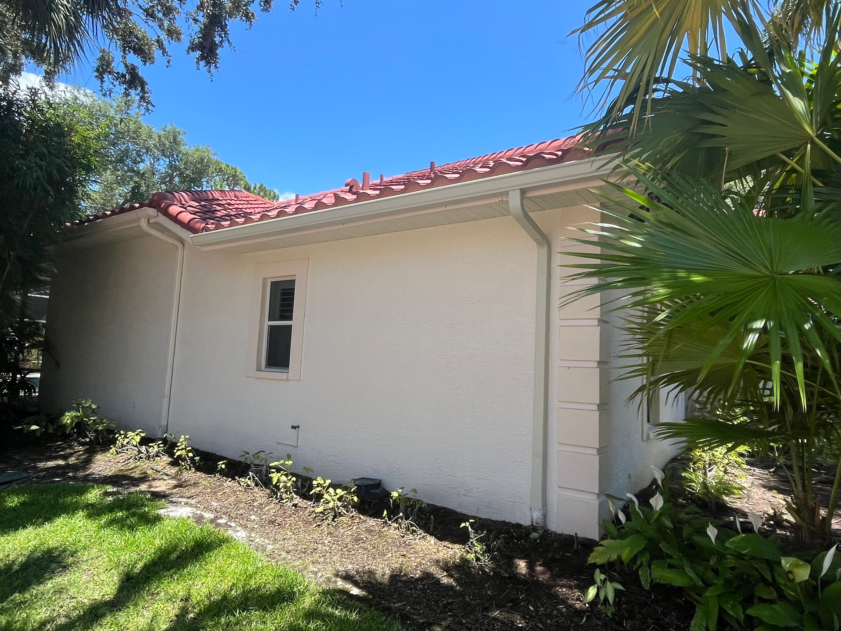 Splash Guard Gutters for Rainy Season Protection in Osprey FL by Gutter Professors