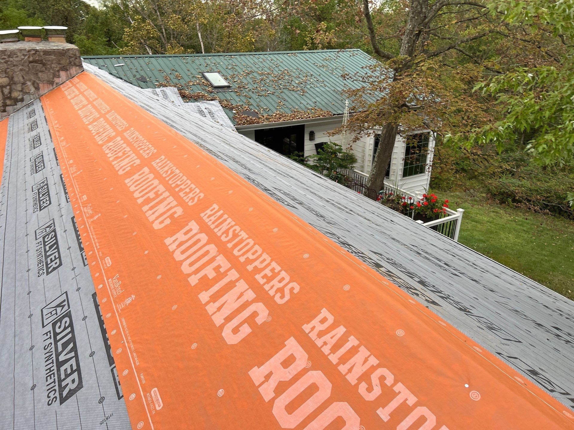 Residential Roofing Installation using Metal by Rainstoppers Roofing