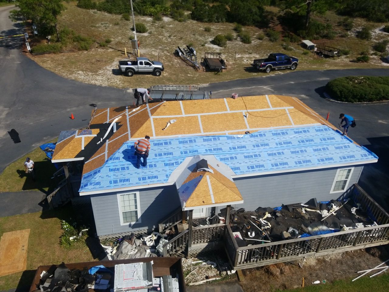 Residential Roofing Installation using Roof Replacement by American Roofing & Construction LLC