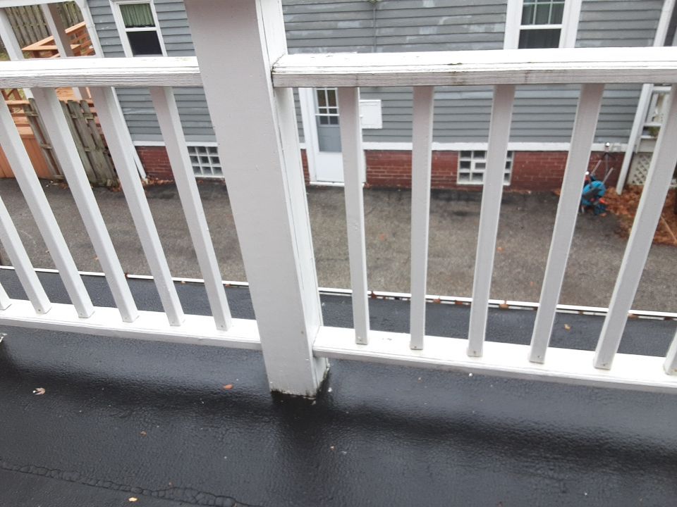 Residential Roof Replacement using Patio Roof by Absolute Roofing and Construction