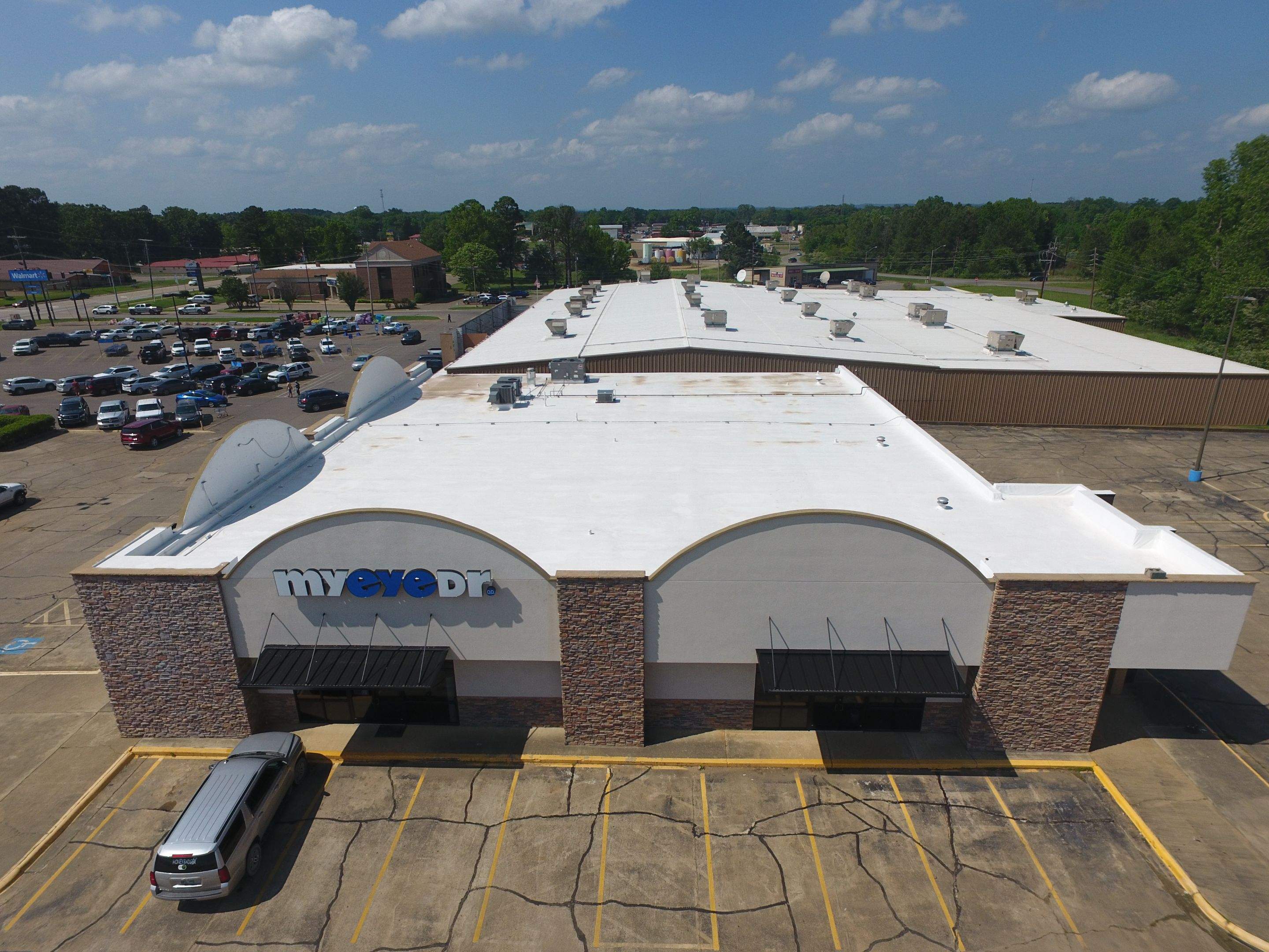 Commercial Roofing Installation using Aldocoat Coatings by Hostetler Roofing