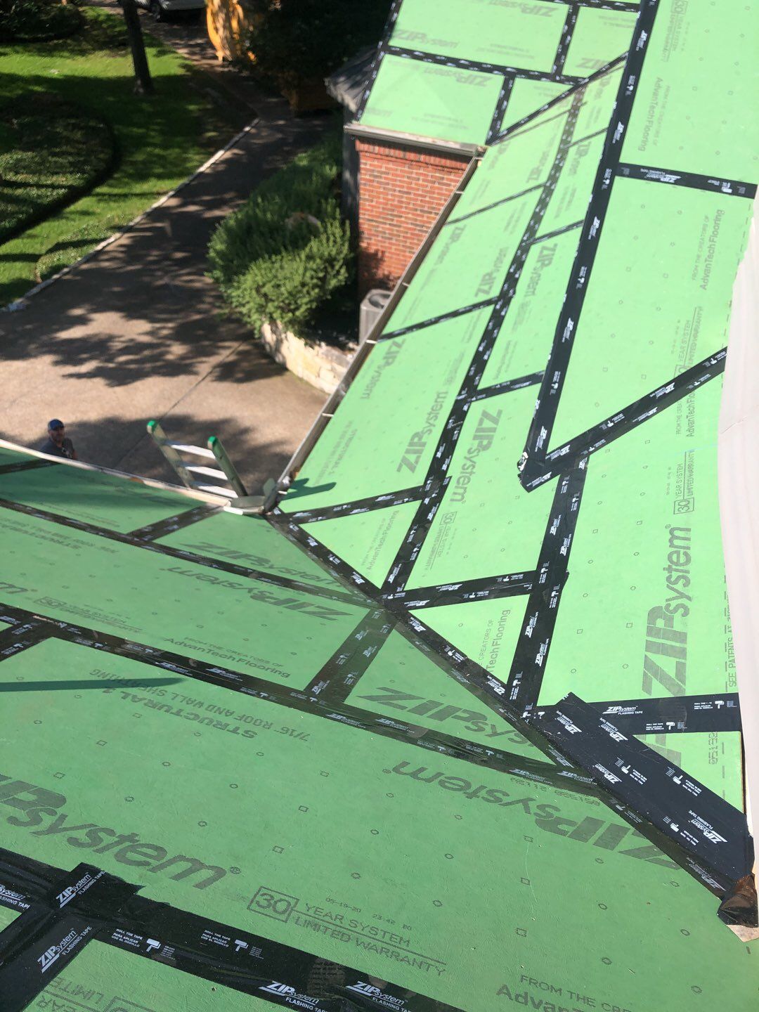 Designer Residential Roof with Zip System by Springtree Restoration