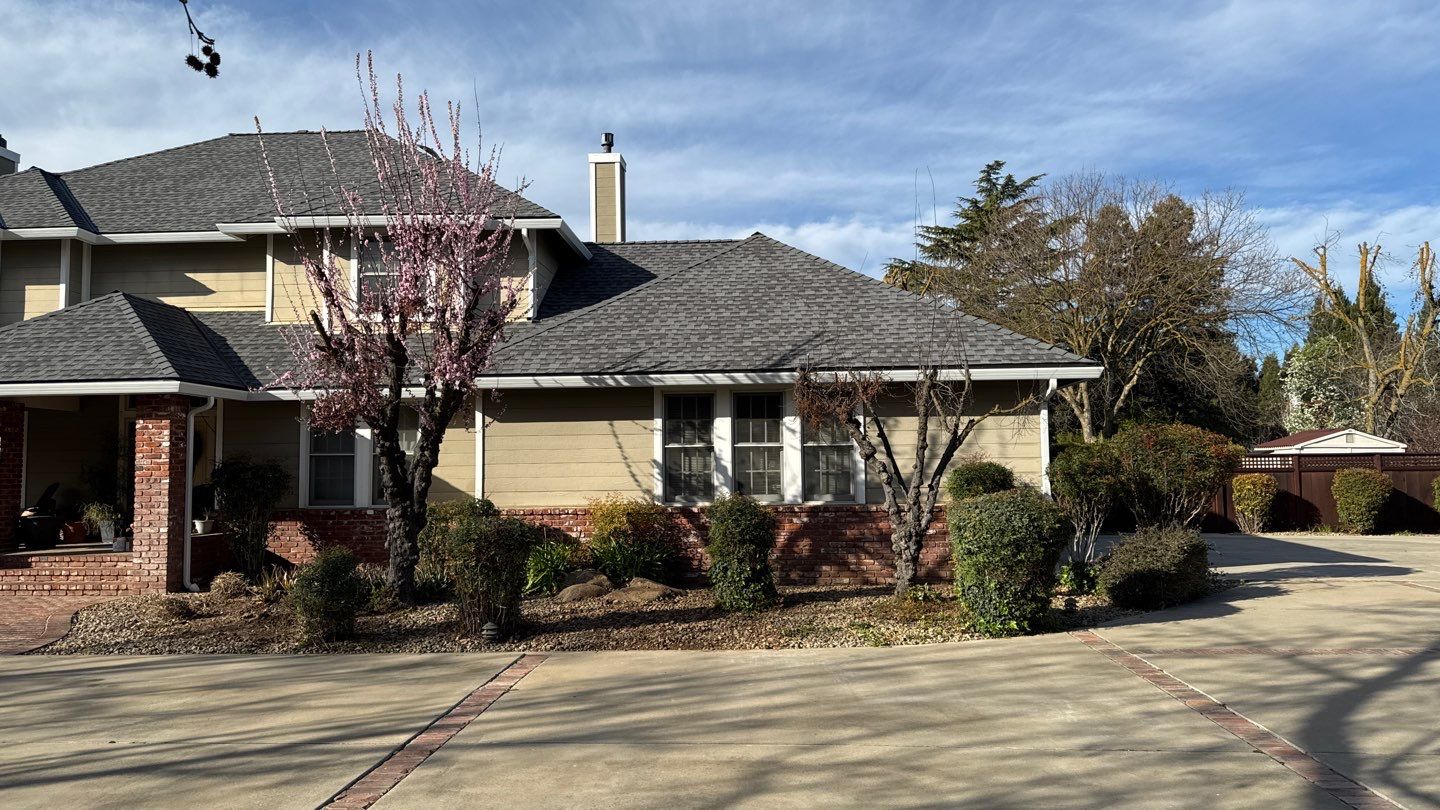 New shingles and gutters using GAF Timberline HDZ shingles and aluminum gutter by Straight Edge Roofing Inc