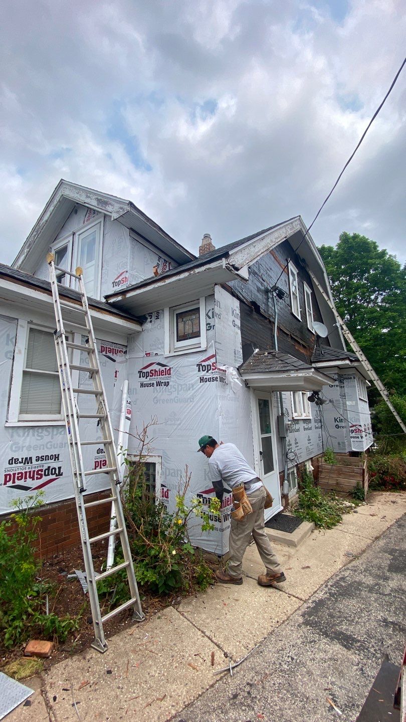 Asphalt Roof, Vinyl Siding, and Aluminum Gutter Replacement by Custom Installations