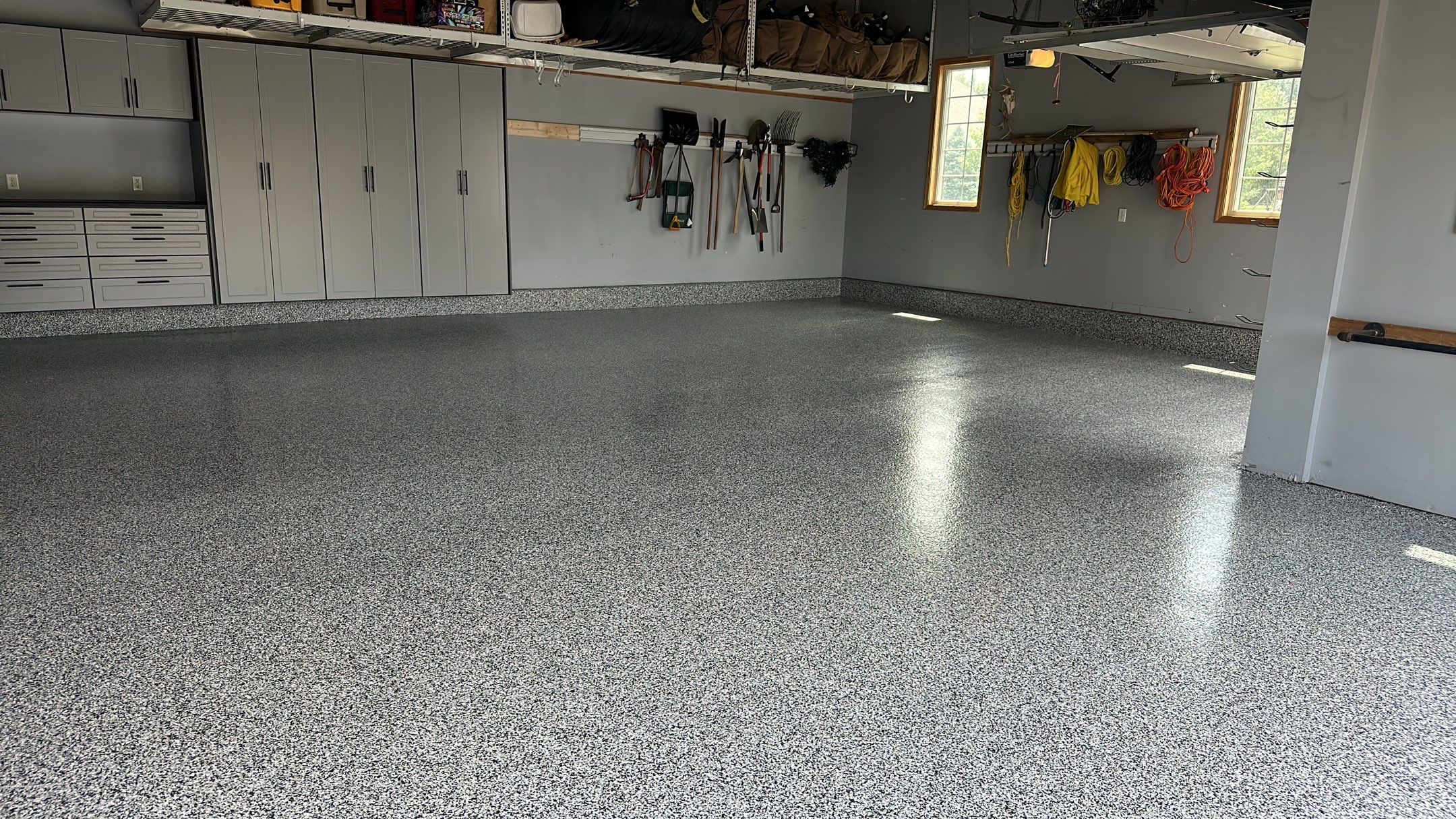 Matt N. took his garage to the next level with our Domino floor and cabinets by Banner Garage