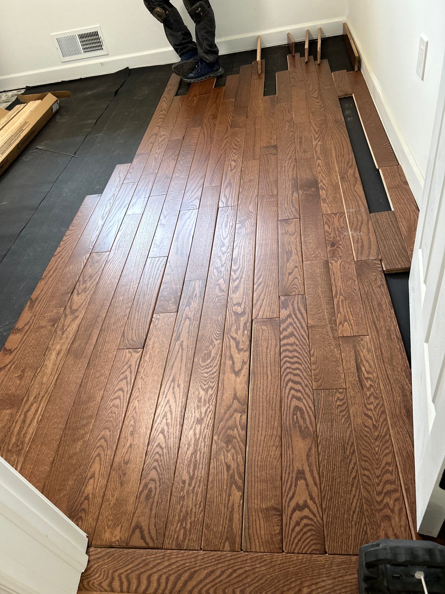 Replaced LVP with timeless solid oak by Footprints Floors of East Atlanta