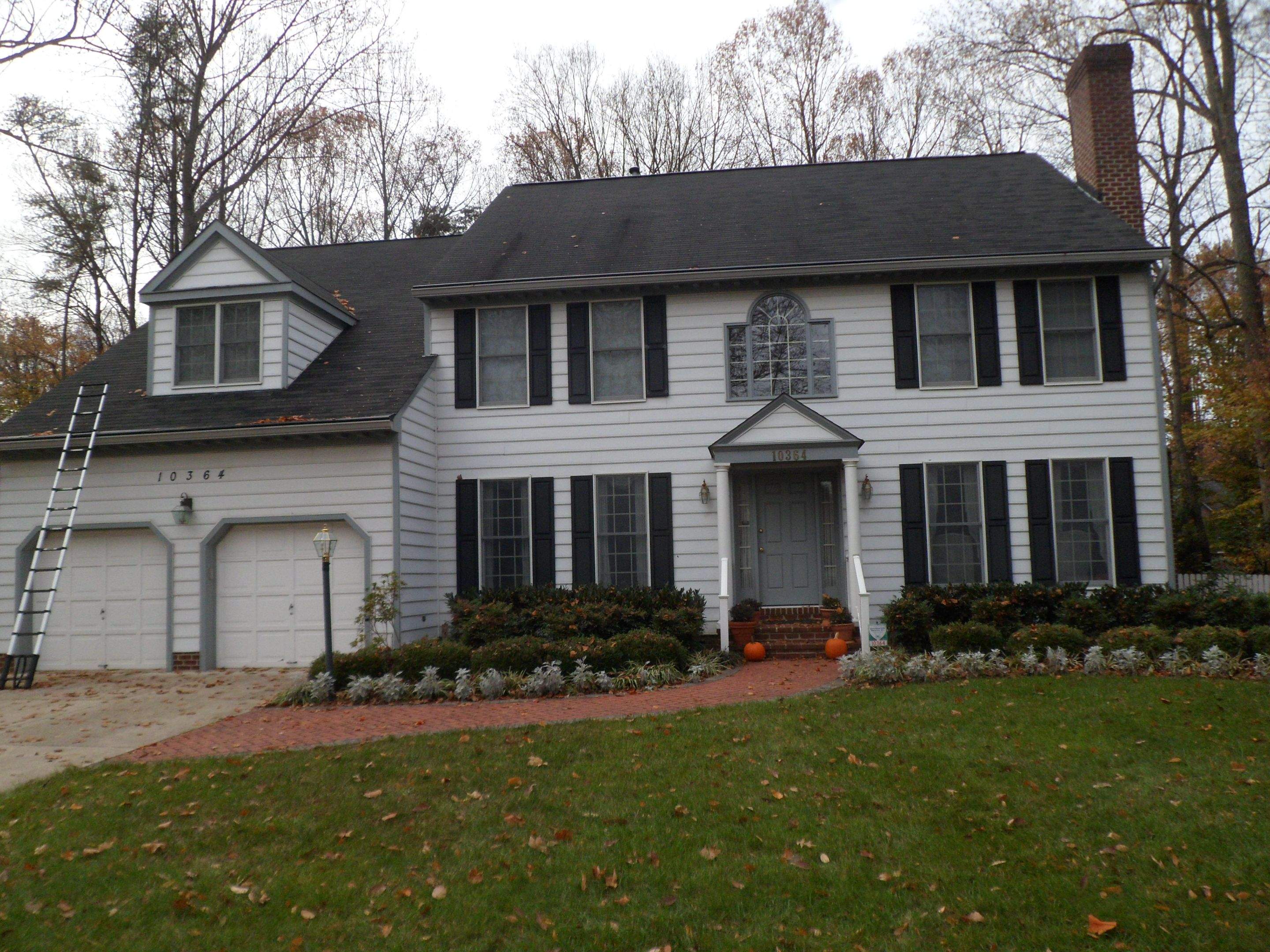 Residential Roofing Installation using Charcoal Black by Alpha Design Services