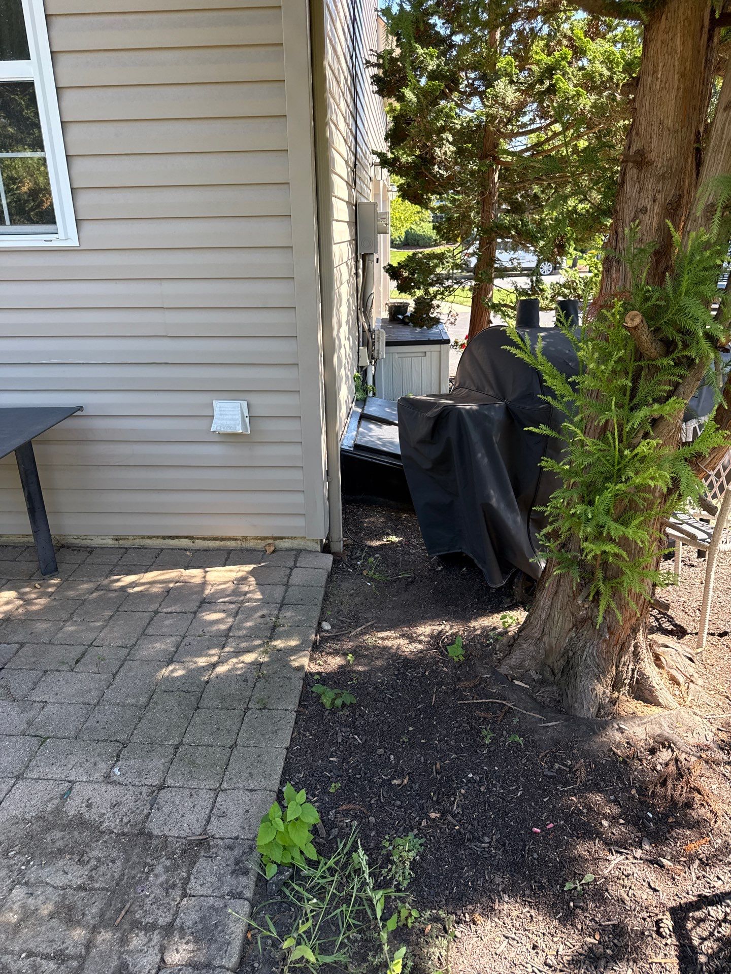 Backyard Retreat: Techo-Bloc Patio + Firepit Lounge by Saylor’s Lawn & Landscape