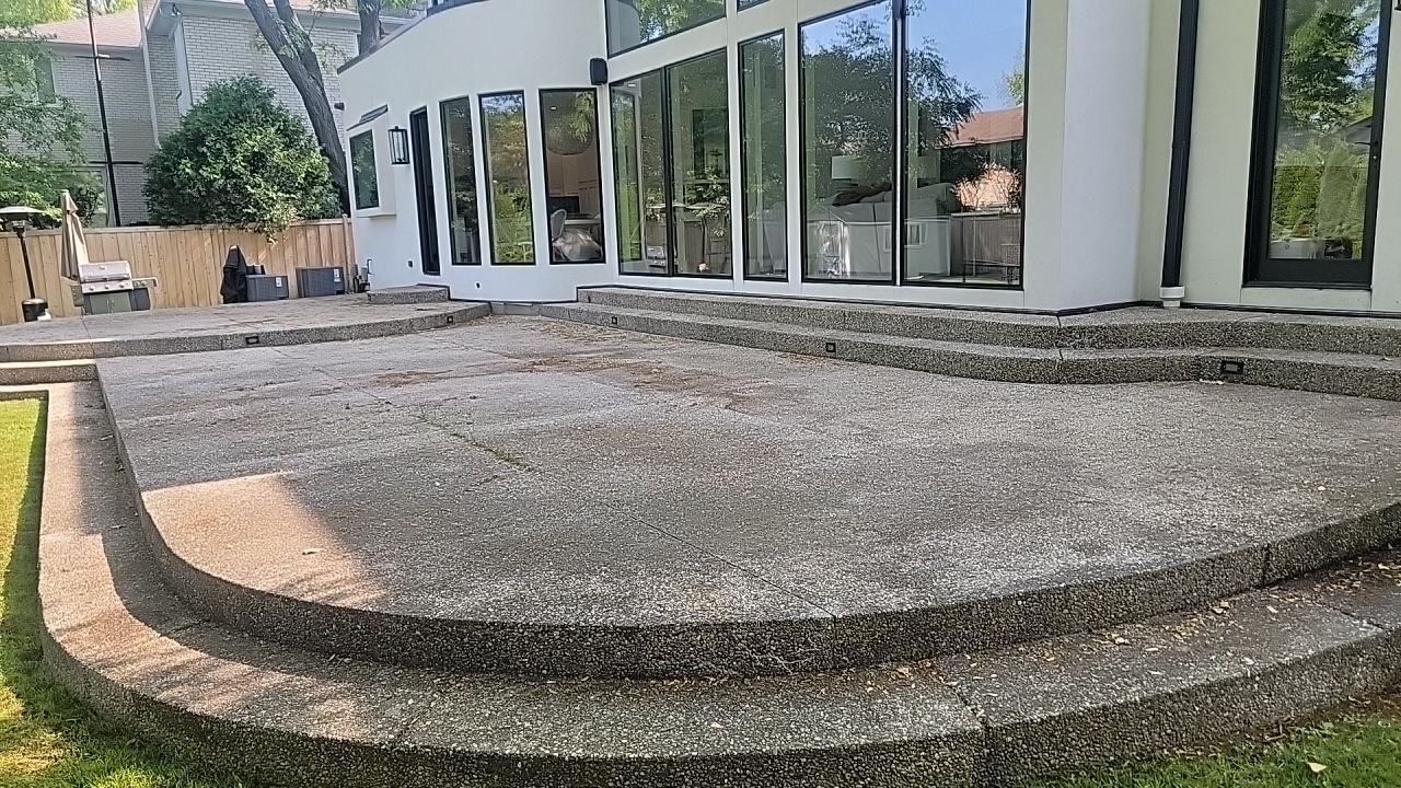 Aggregate concrete cleaning and sealing using Surebond SB-9000 by Northern Power Washing LLC.