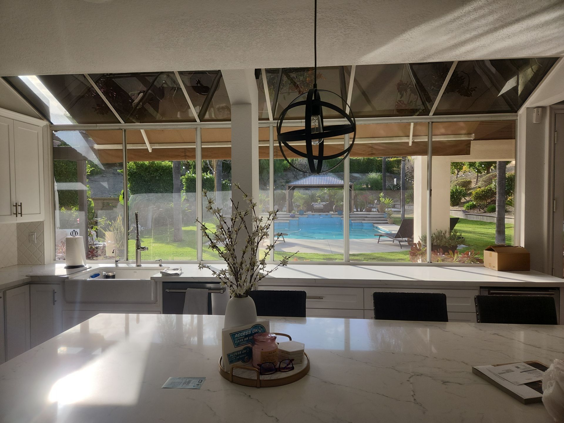 Window Installation using Anlin vinyl windows with Sunshield glass by American Window Company