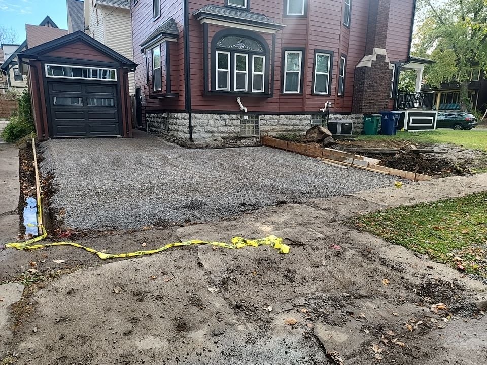 Exterior Renovations- Siding, Stamped Concrete, Porch, and Railings by Ivy Lea Construction