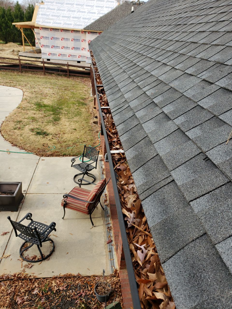 Gutter Cleaning using water by Power Wash Masters LLC