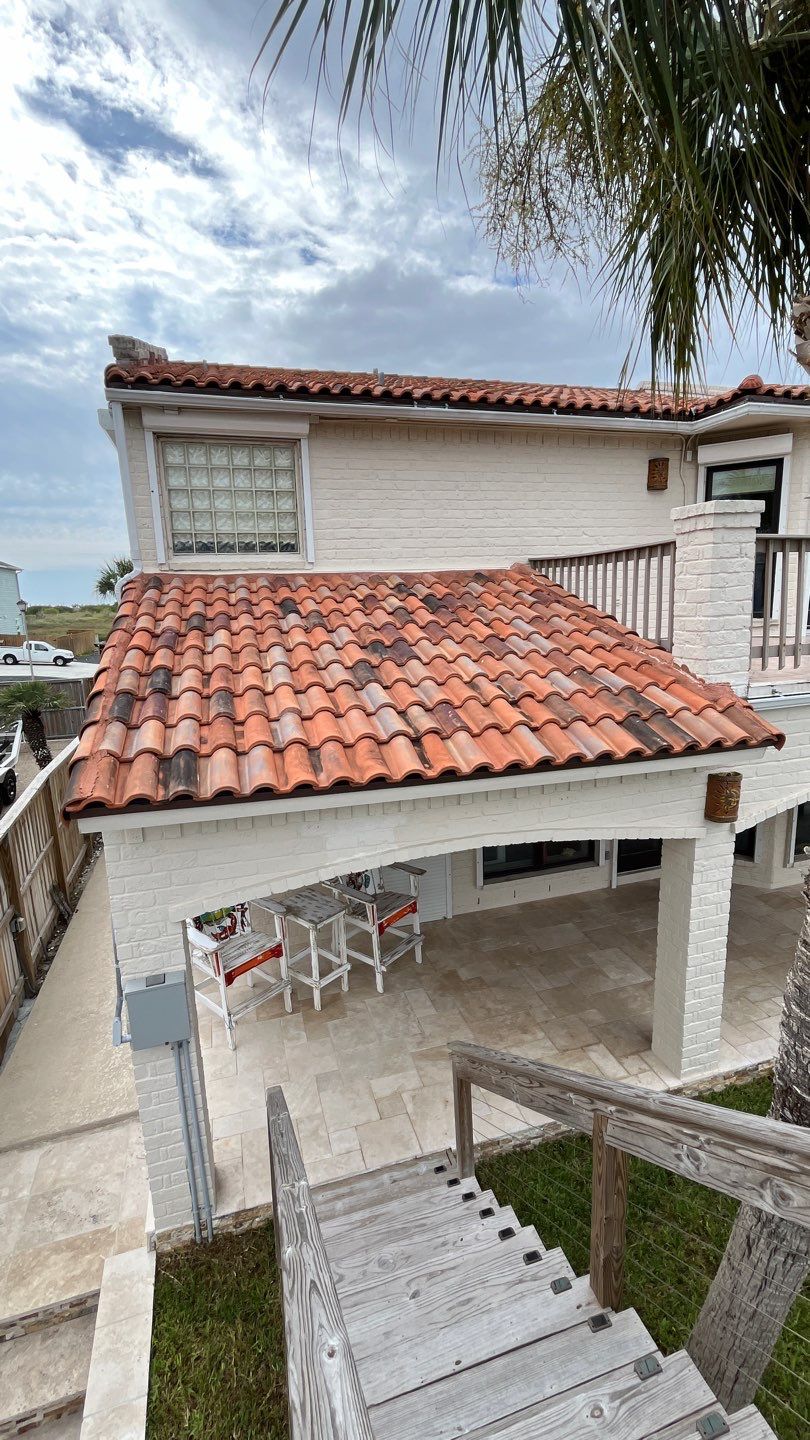 Off with the Tile and on with the TILCOR stone coated metal.  by Bayfront Roofing and Construction