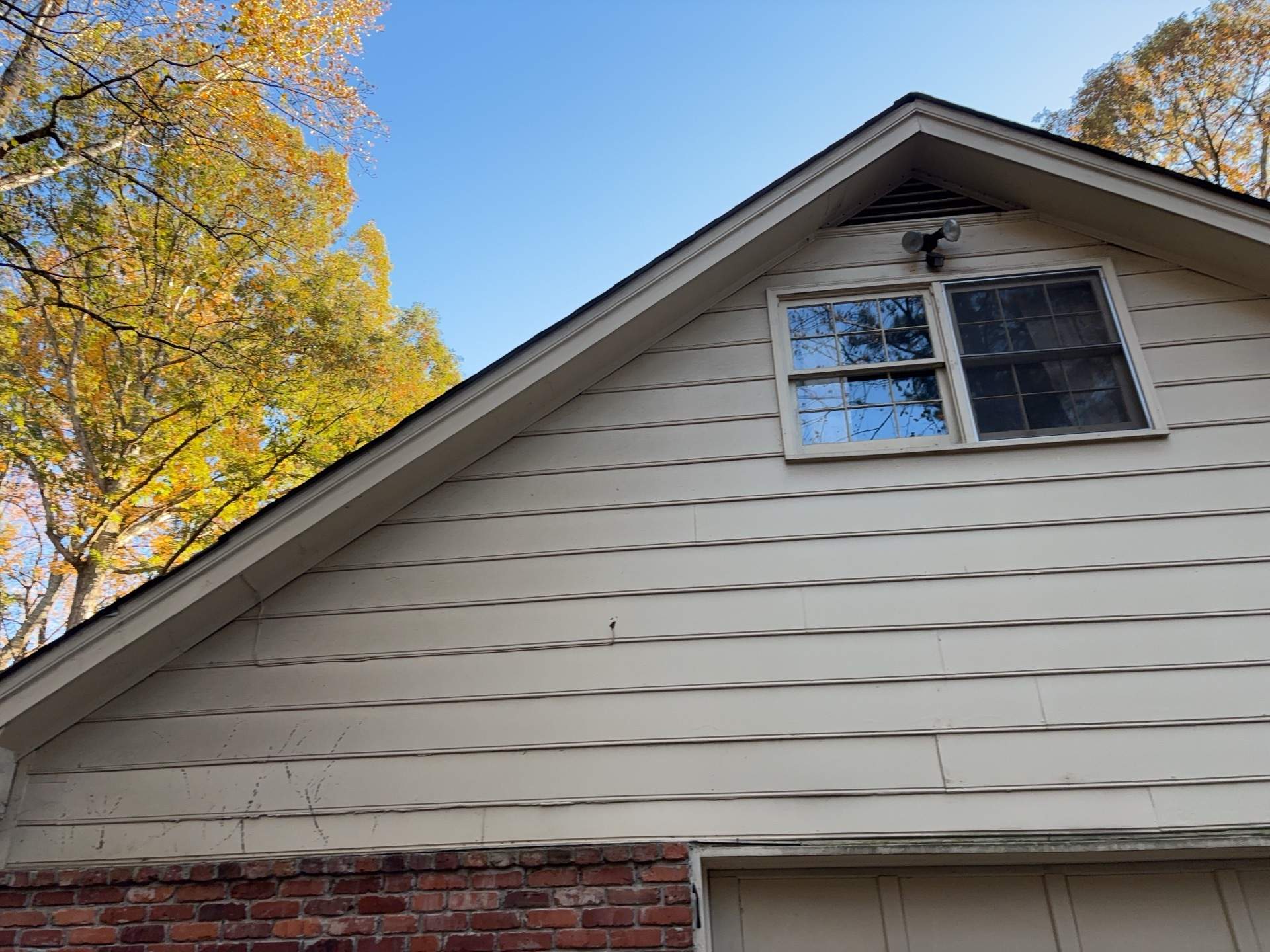 Gable Siding Replacement with James Hardie HZ10 Lap Siding by Nelson Exteriors 