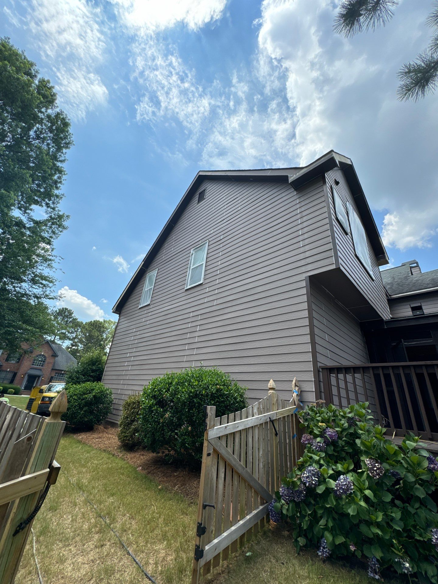 Full Exterior Painting and Gutter Replacement for Powder Springs Home by Swift Home Renovations