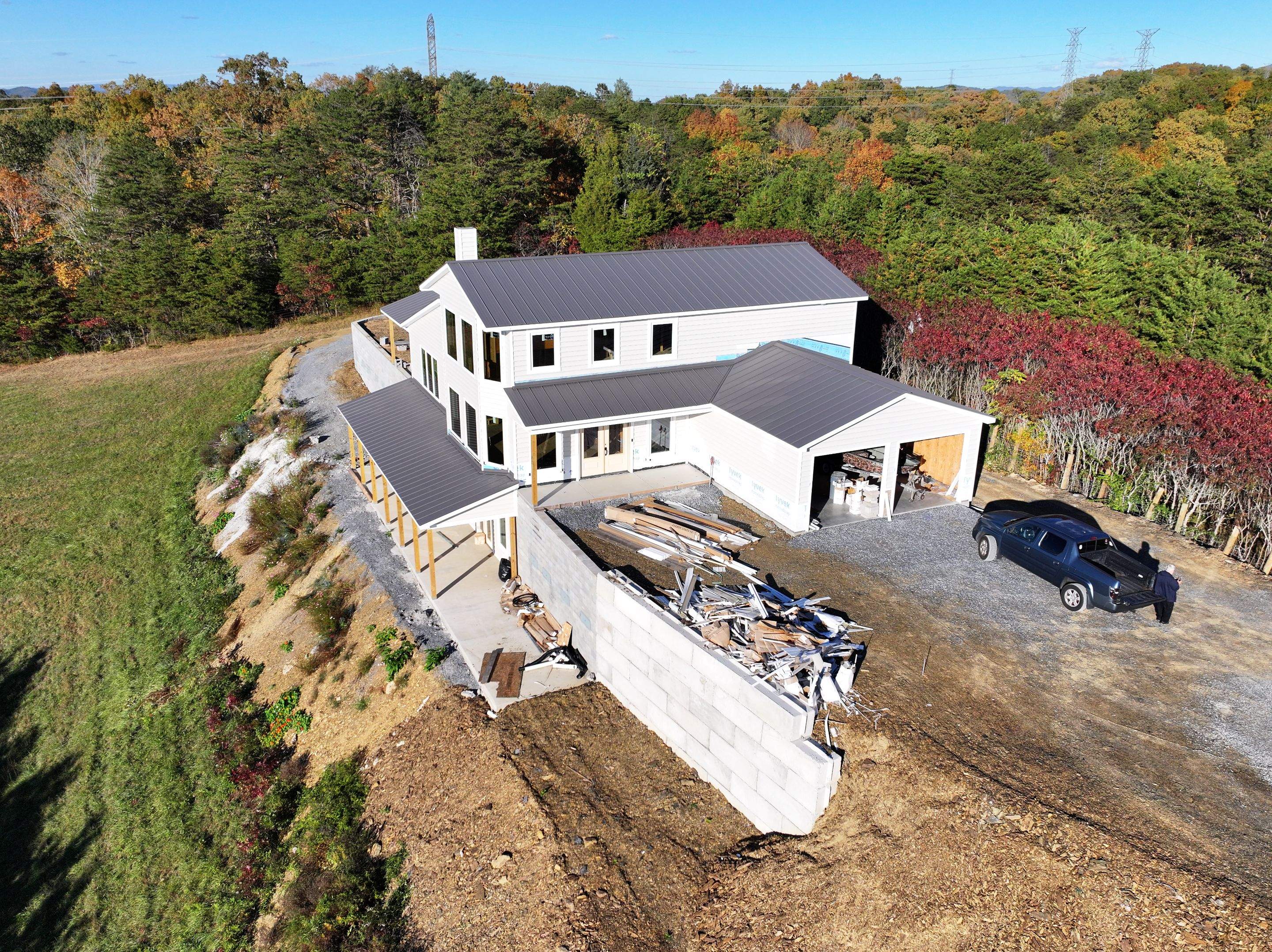 Textured Charcoal Gray Standing Seam by Omnia Roofing