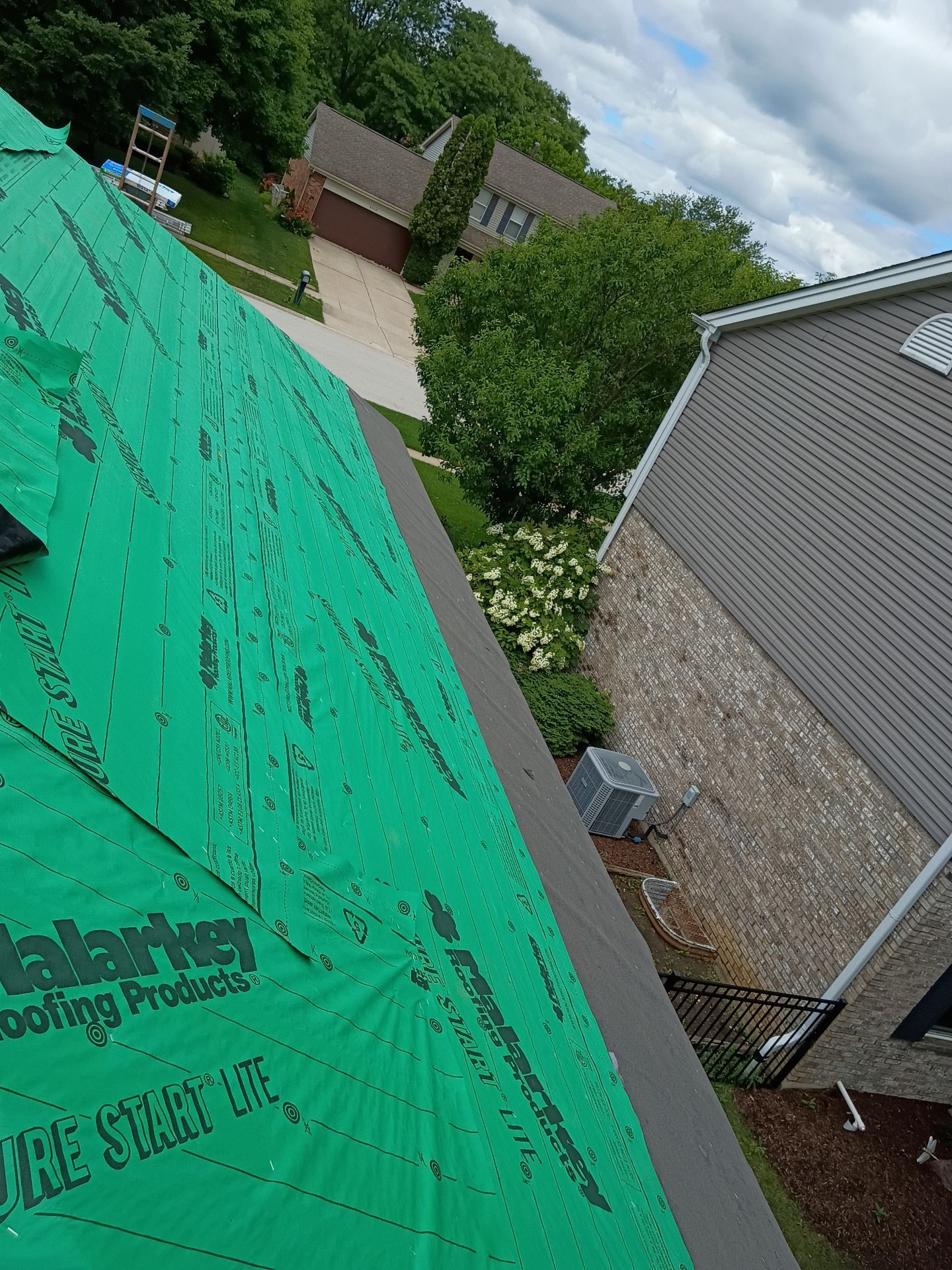Residential Roofing and LP Smartside Siding Replacement in Woodridge by Pro Home Services Inc