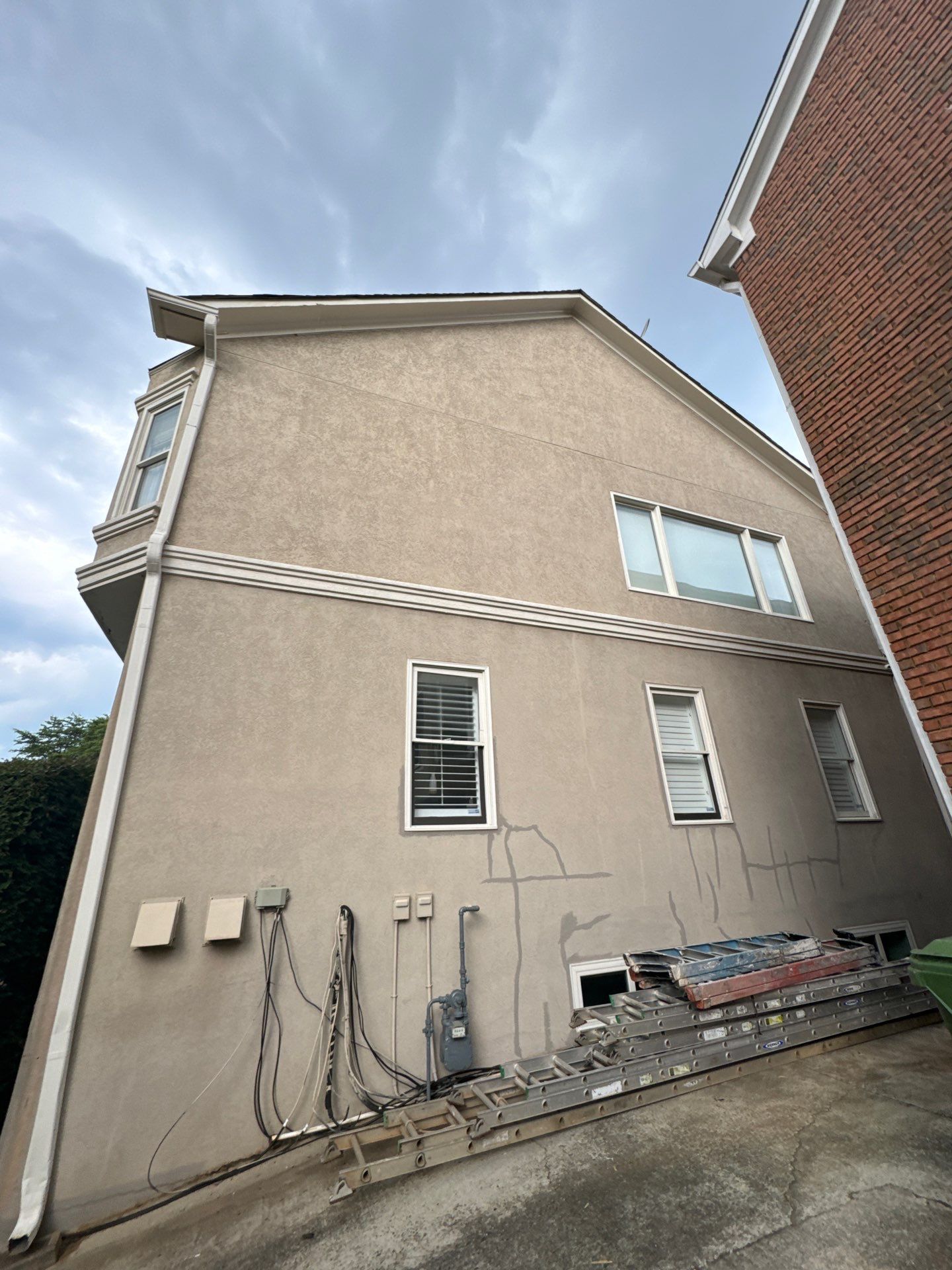 Full Exterior Stucco Painting and Wood Deck Staining in Atlanta by Swift Home Renovations