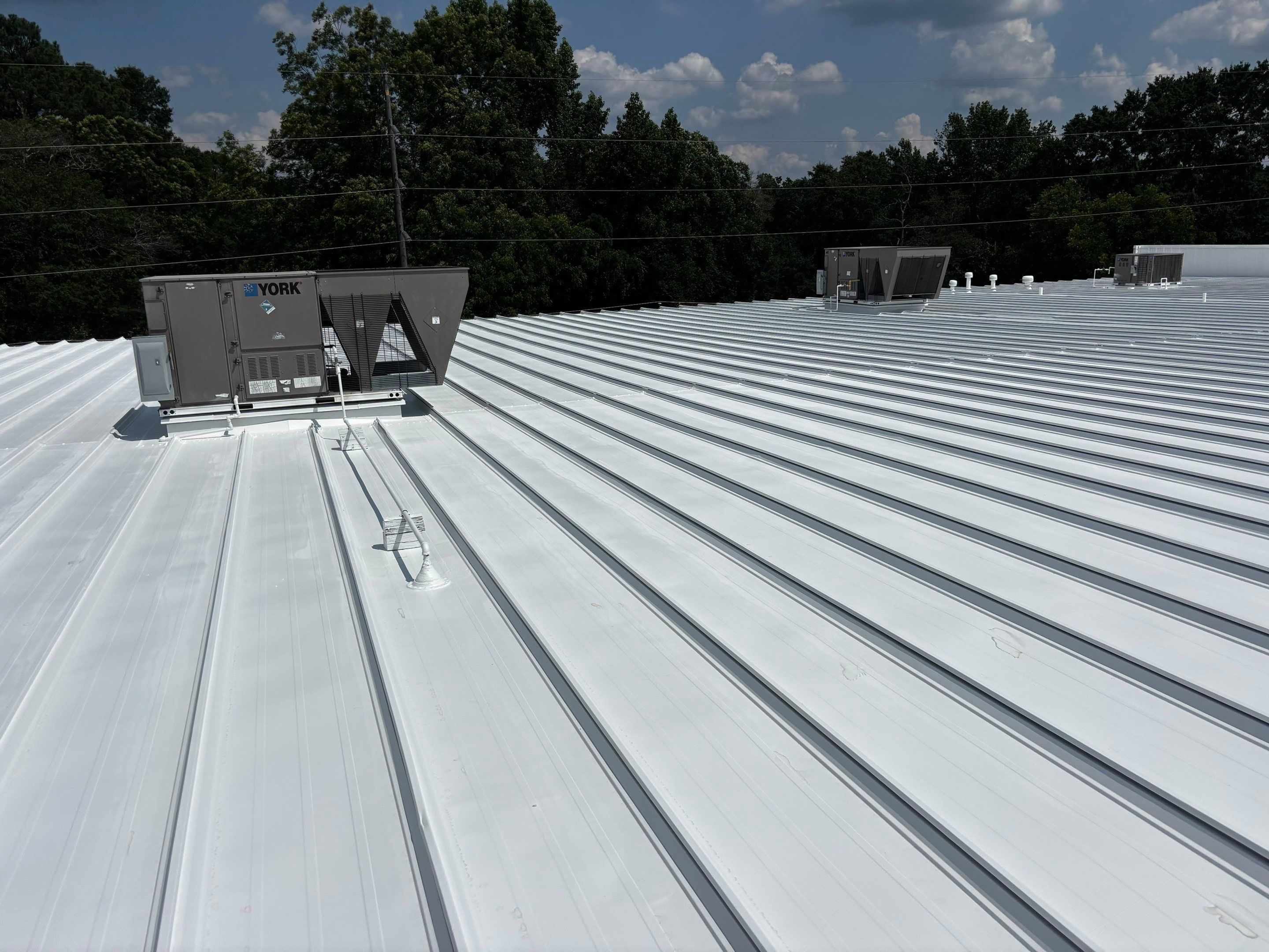 12,180 SQ Ft Commercial Metal Roof Restoration in Clarkston by Southern Roof Solutions