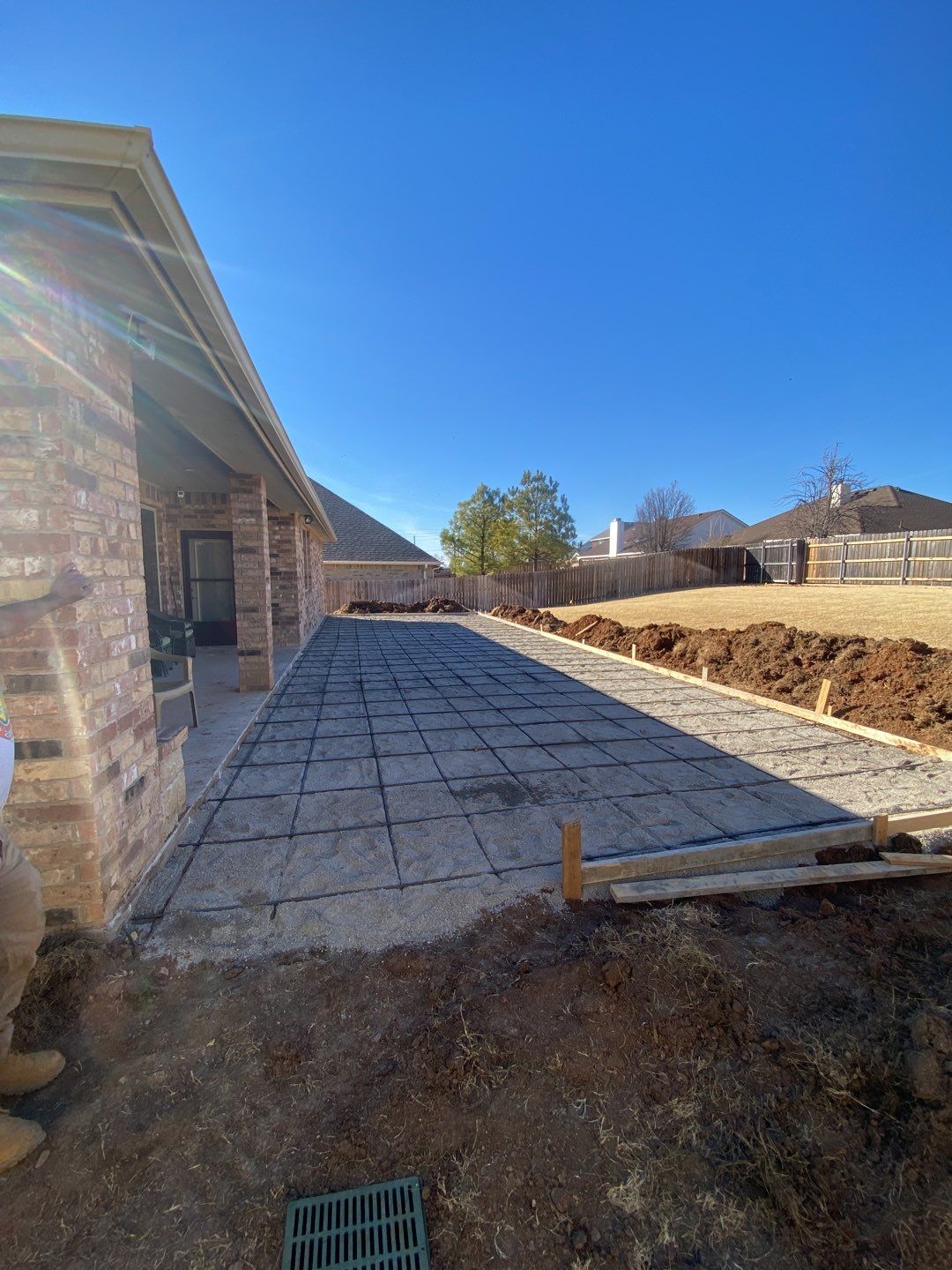 Concrete Slab , Retaining Wall , Fence, and landscape. by Clays Services Inc