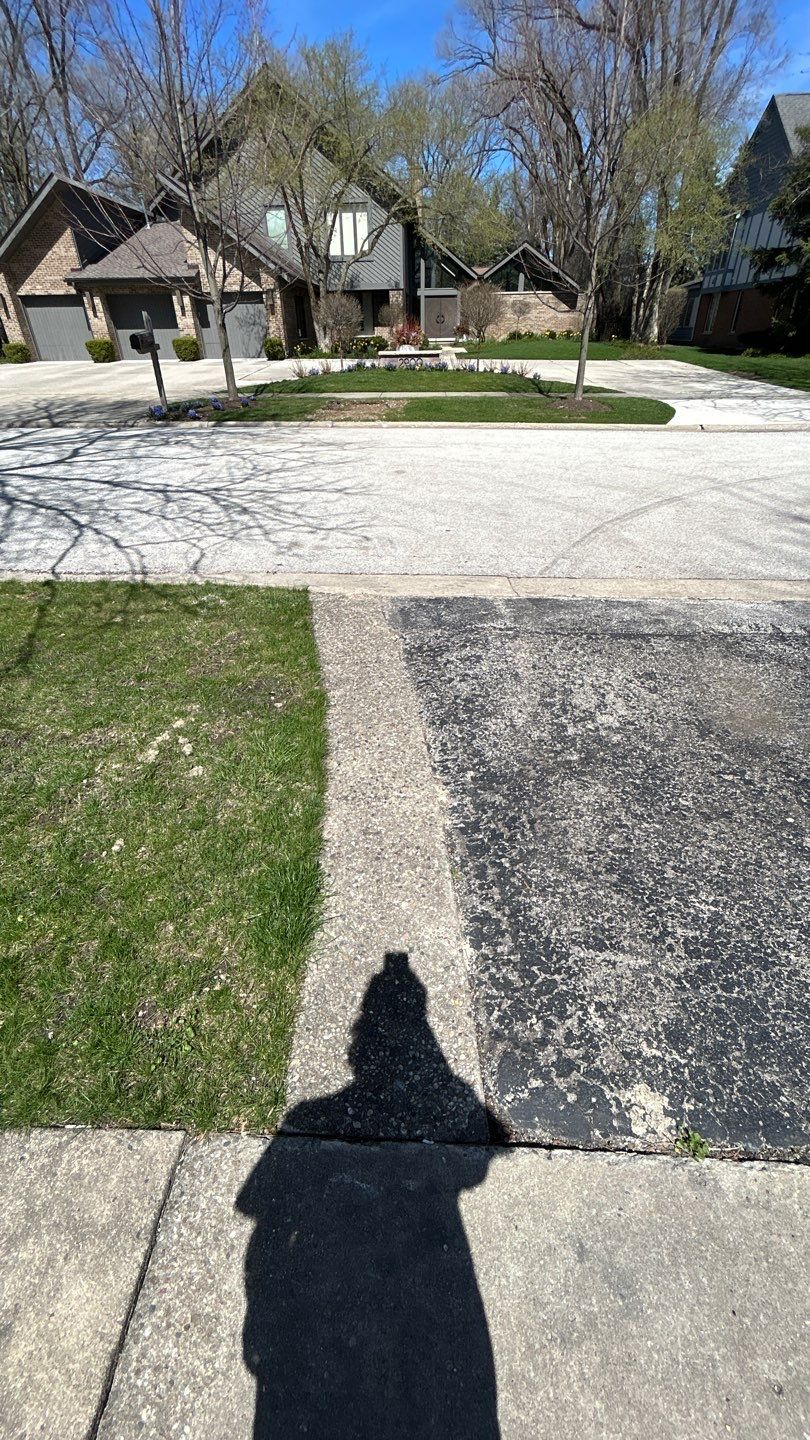 Aggregate Clean and seal using low gloss sealer by Northern Power Washing LLC.