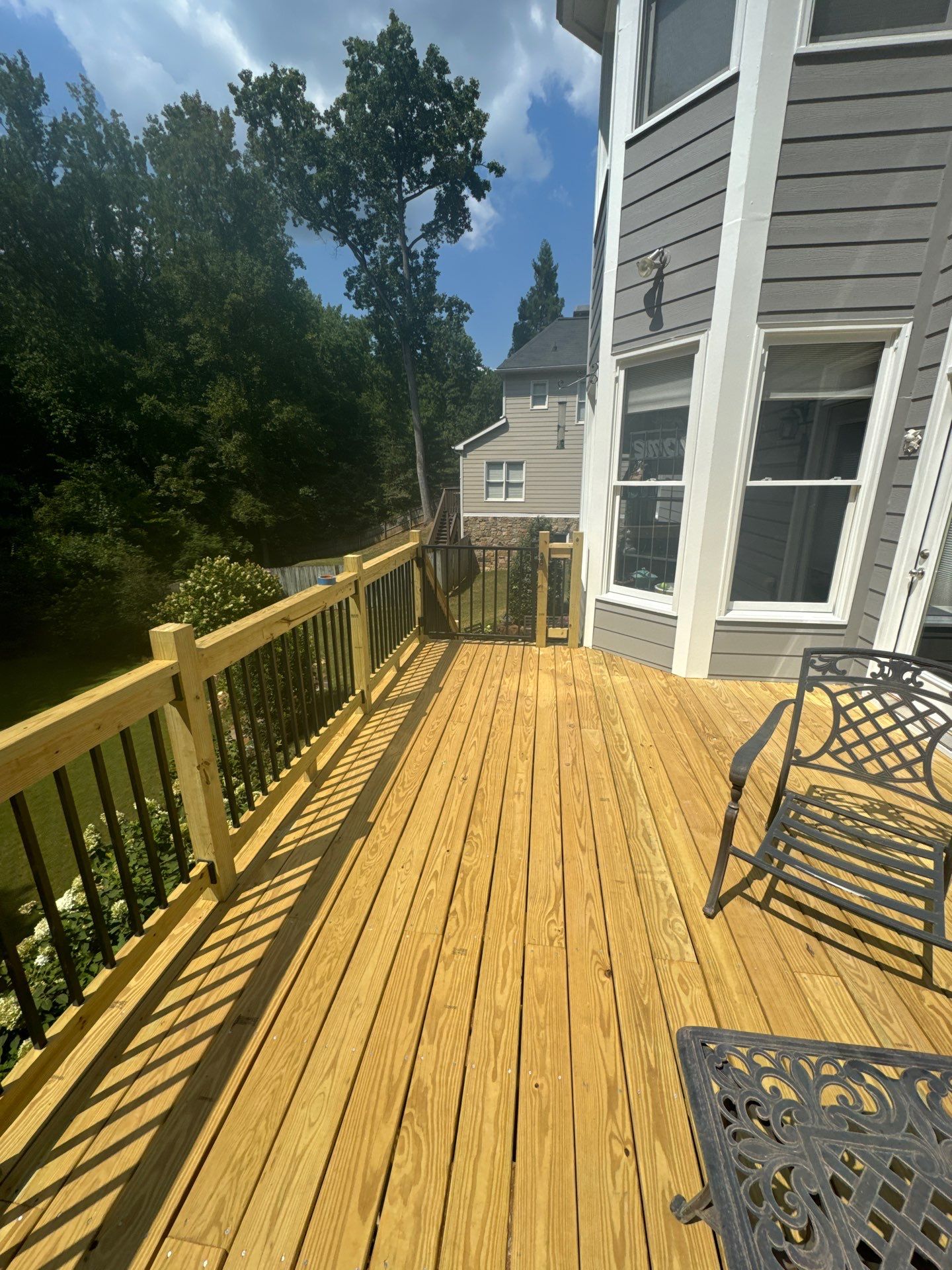 Pressure-Treated Wood Deck Replacement with Metal Balusters in Acworth by Swift Home Renovations
