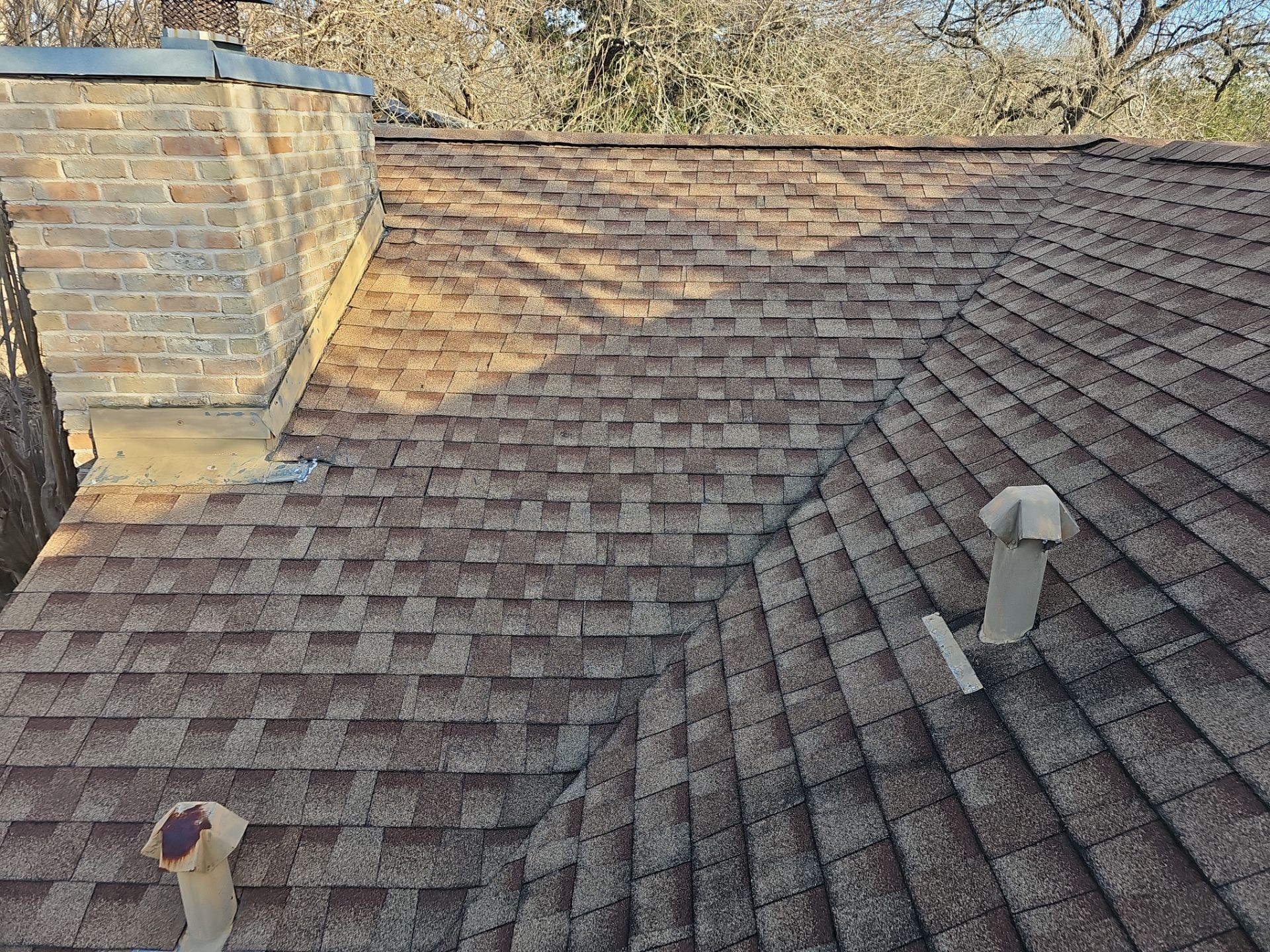 Residential Roofing Installation using Owens Corning Oakridge Brownwood by DeZign Roofing & Exteriors