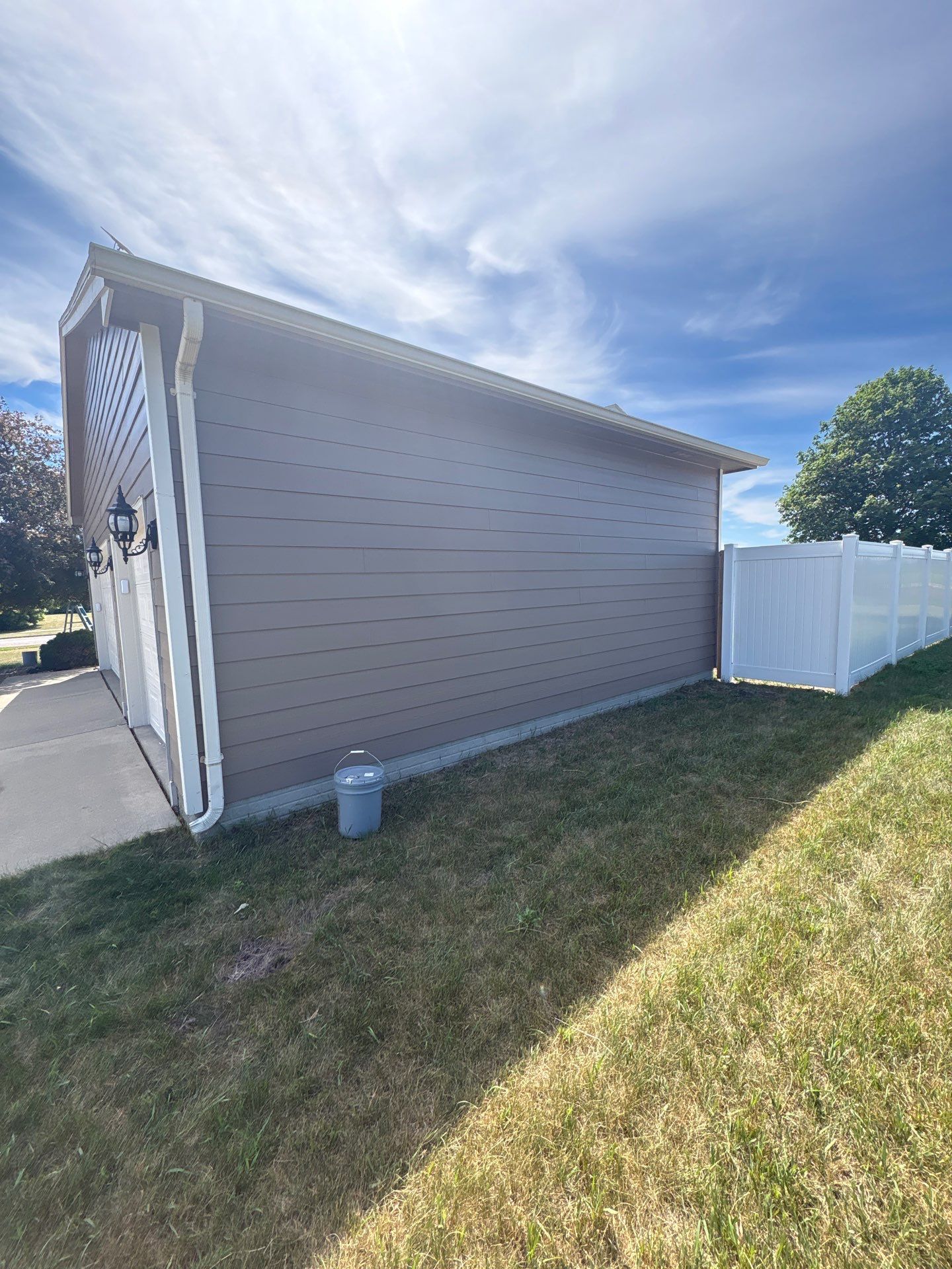 Exterior Painting and Siding Restoration for Harrisburg Residential Home by Select Painting, Coatings & Garage Cabinets