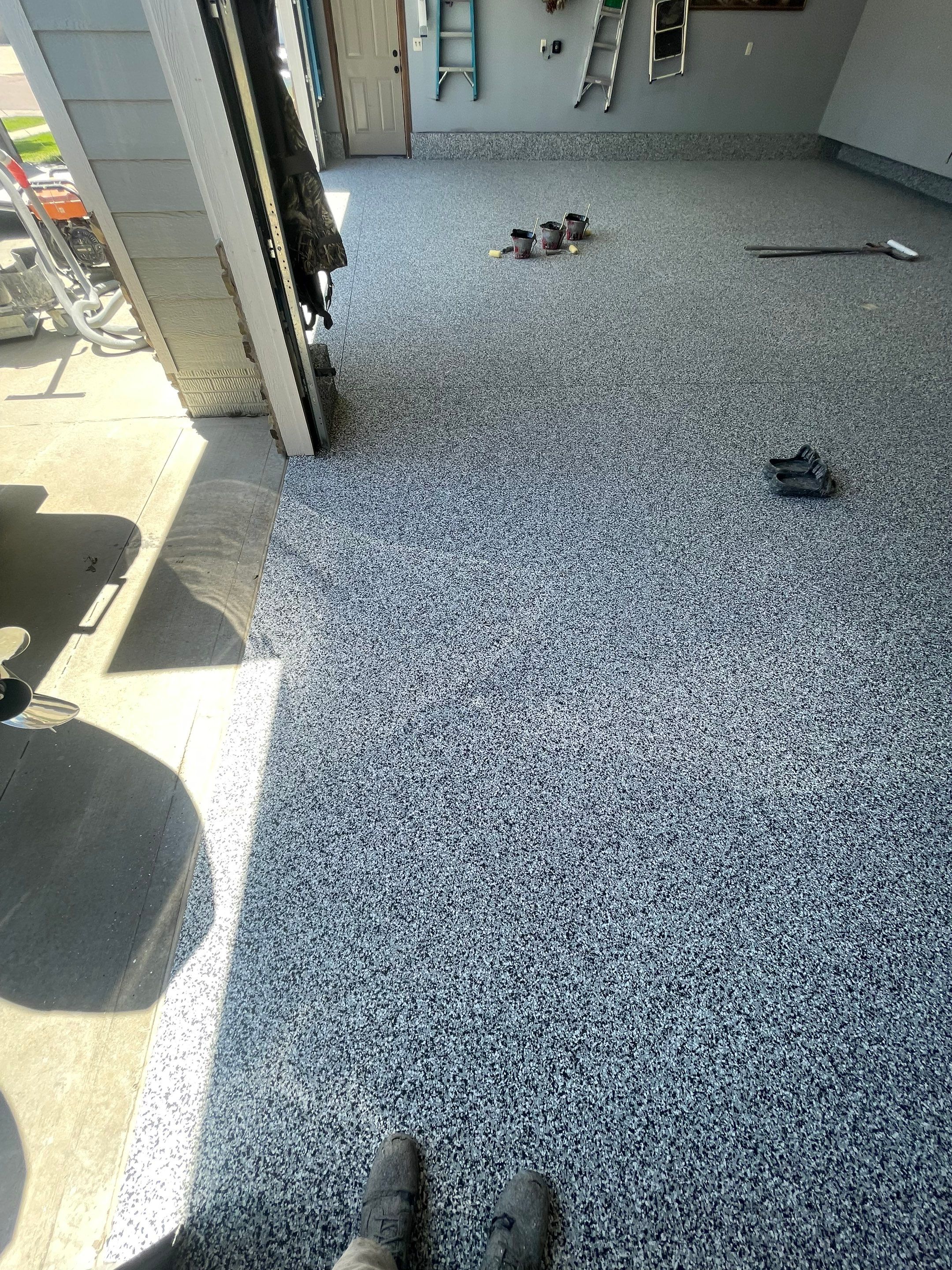 Residential Garage Floor Coating in Sioux Falls by Select Painting, Coatings & Garage Cabinets