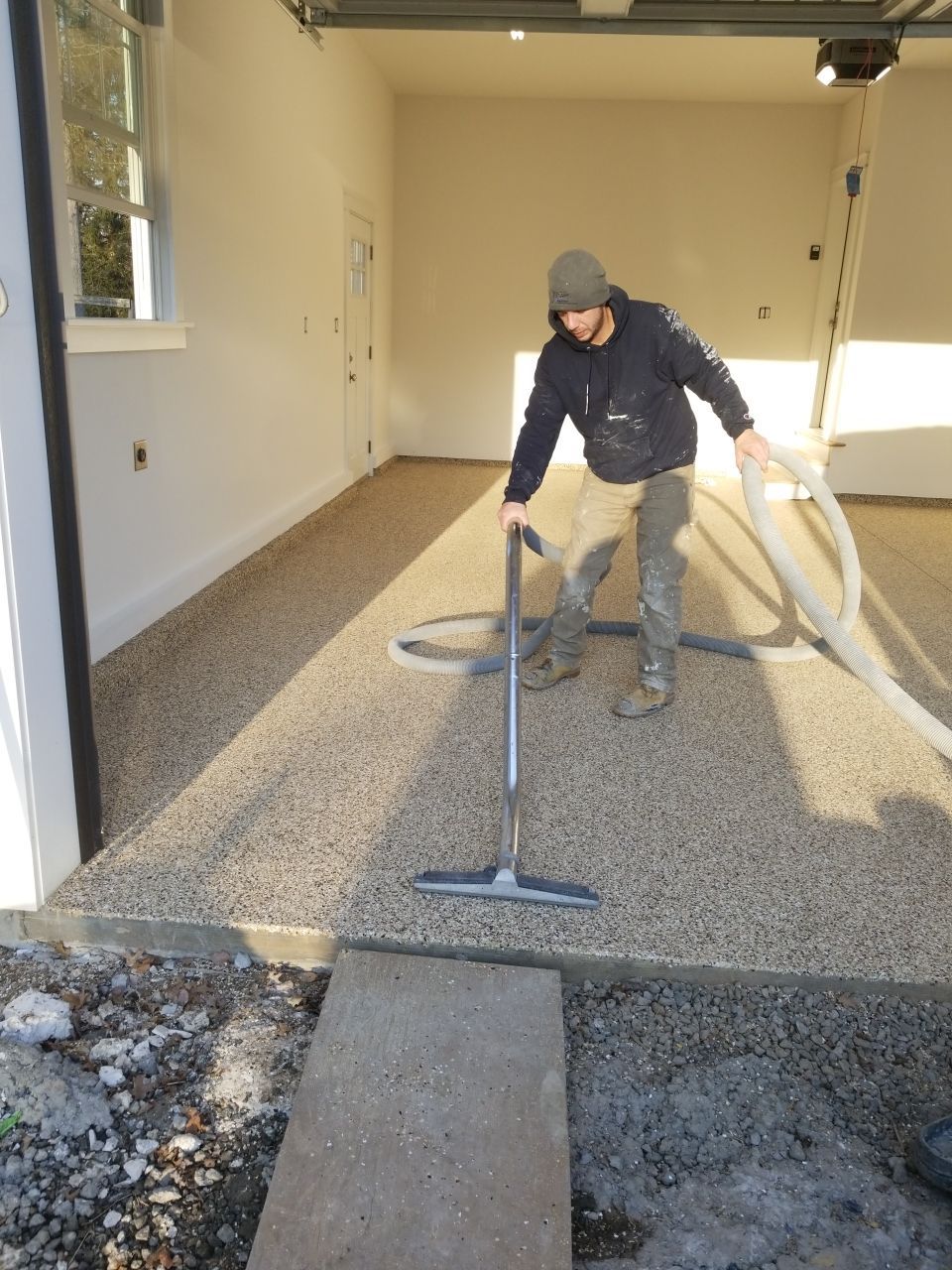 Garage Floor in Sandstone by Spectrum Painting, LLC