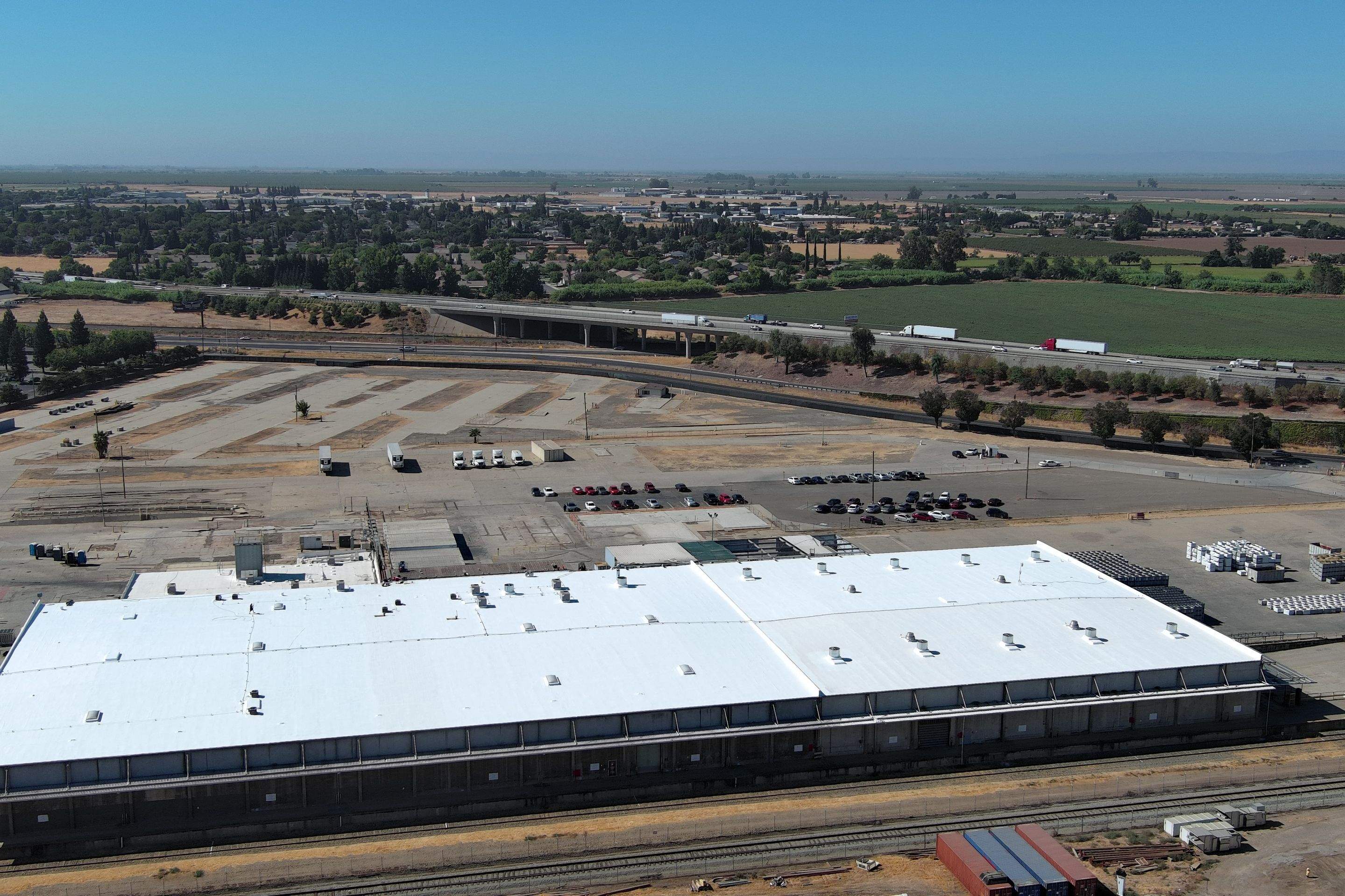 Pro Farms Spray foam roofing project by Straight Edge Roofing Inc