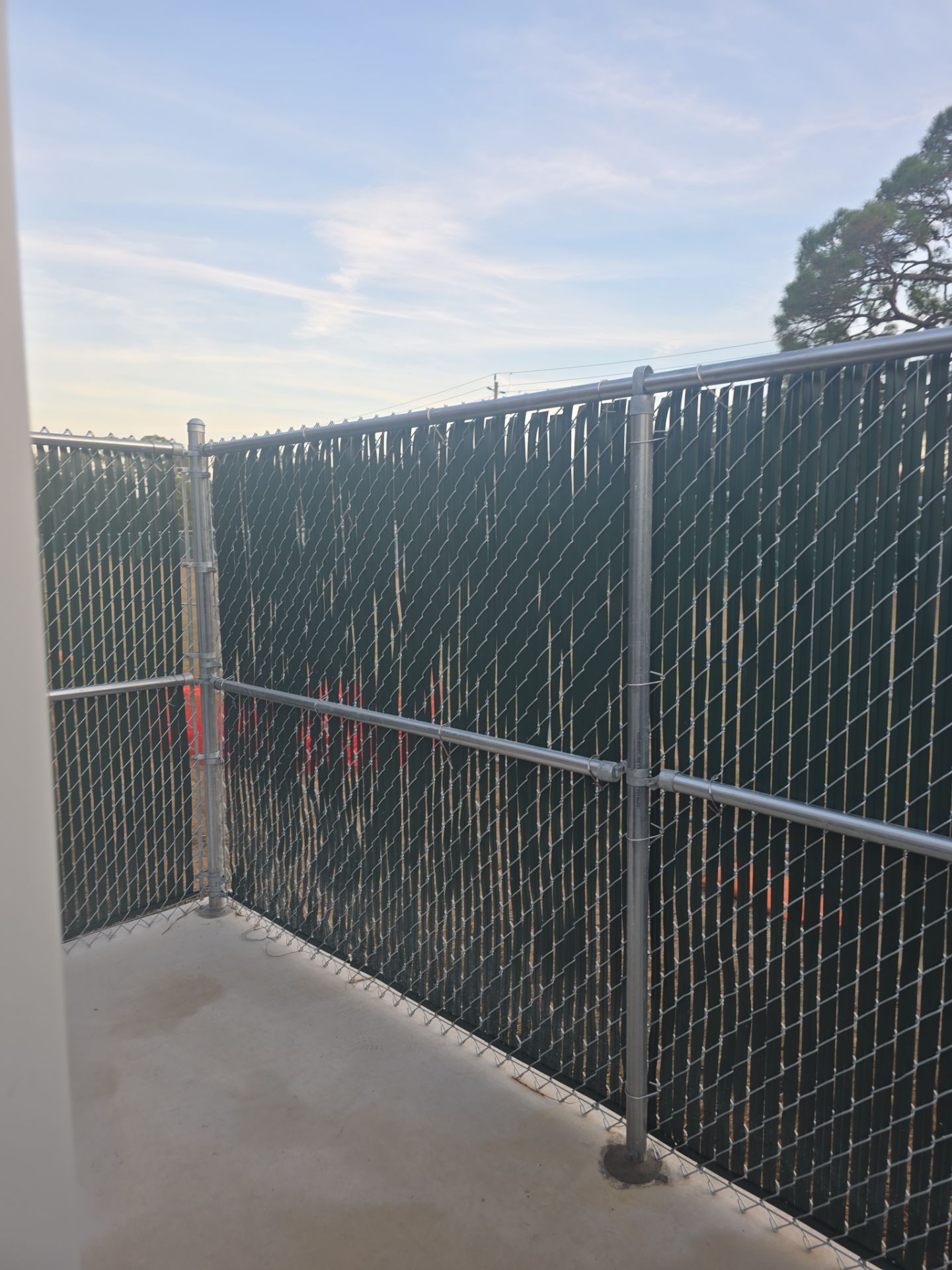 Commercial Chain Link Fence with Slats in Port Charlotte by True Fence LLC