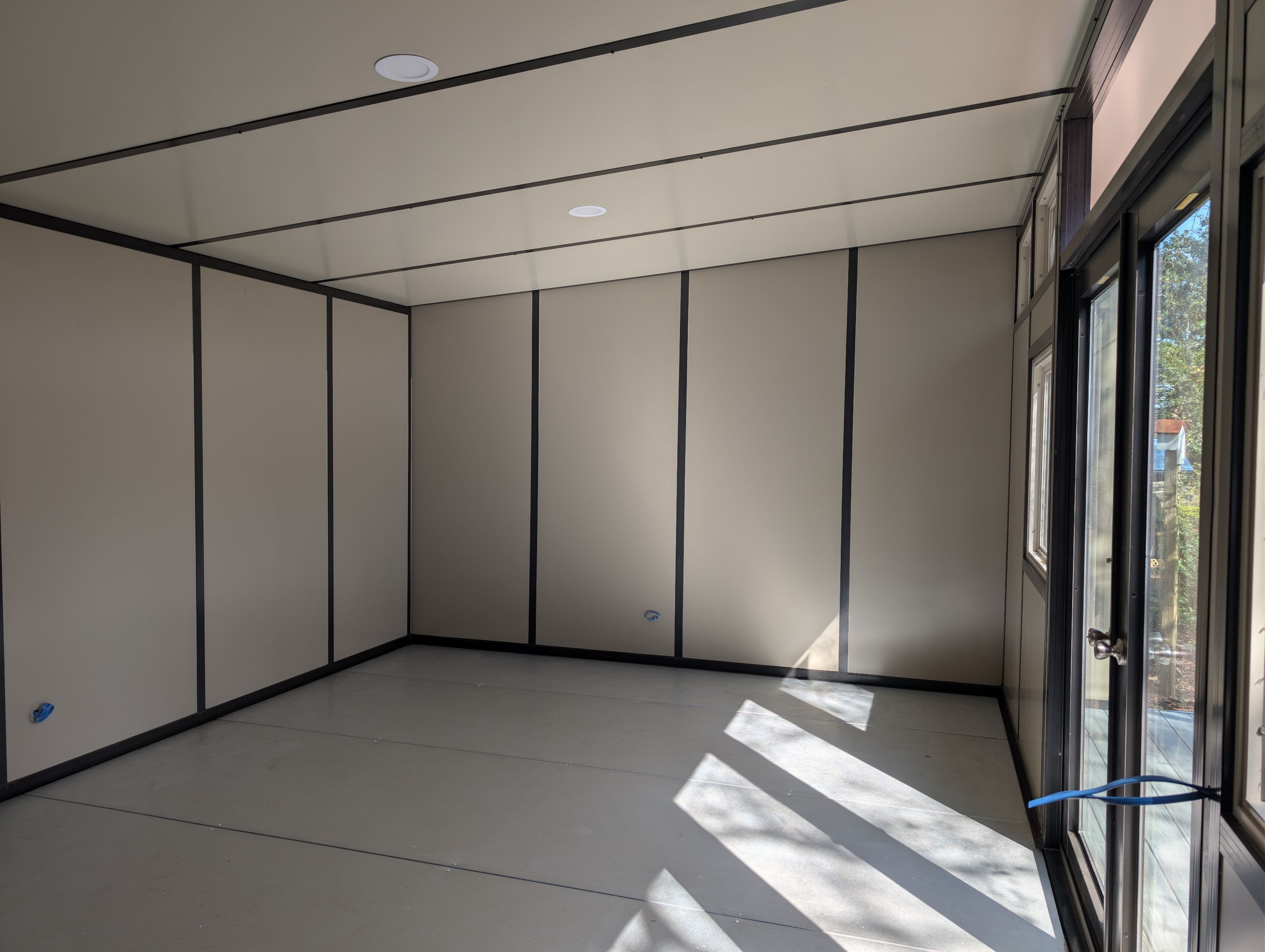 Titan Blockhouse Backyard Home Addition by Titan Sunrooms