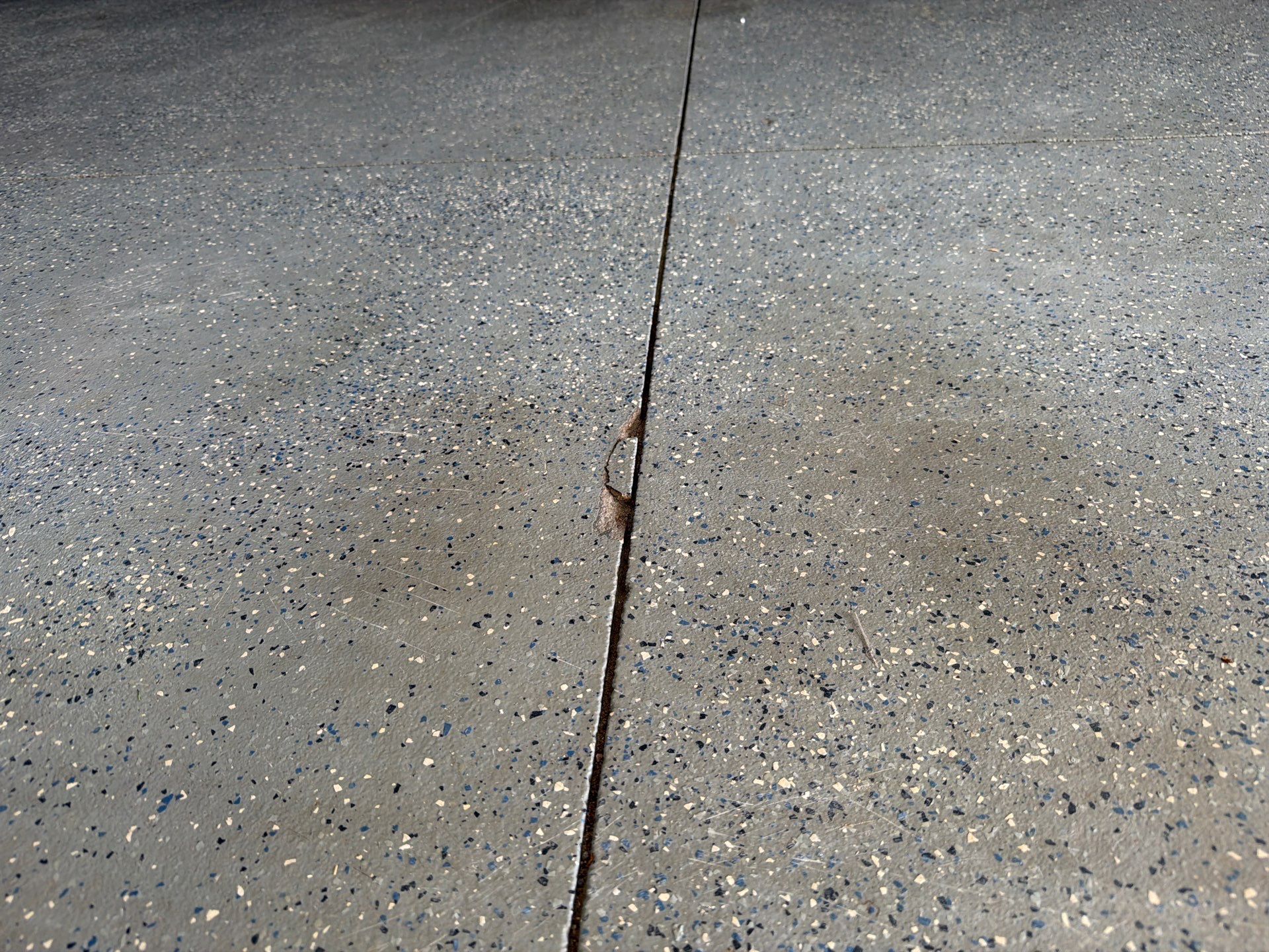 Residential Garage Floor Coating in Sioux Falls by Select Painting, Coatings & Garage Cabinets