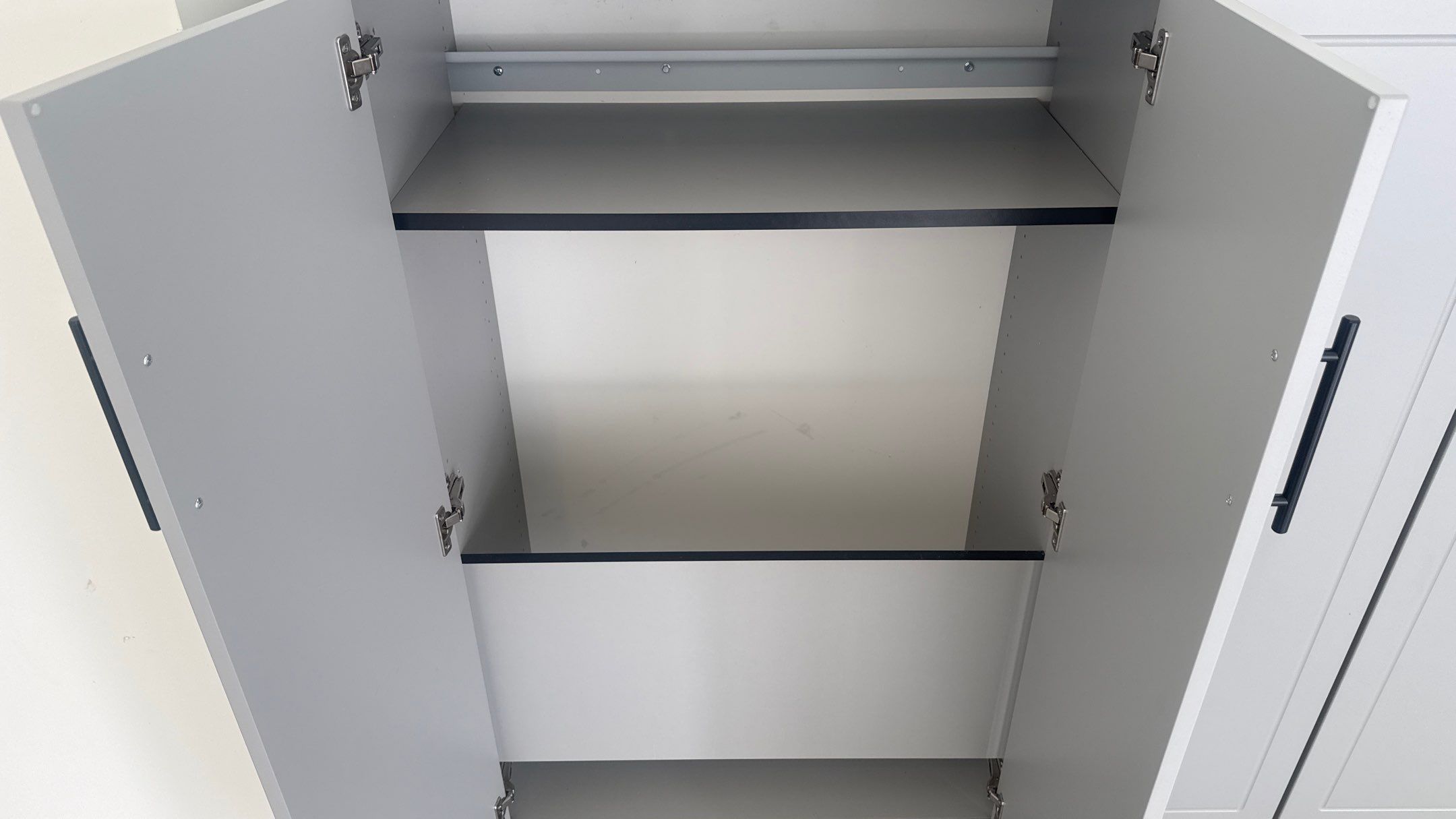 Nick's New Floor & Storage Looks Beautiful by Banner Garage