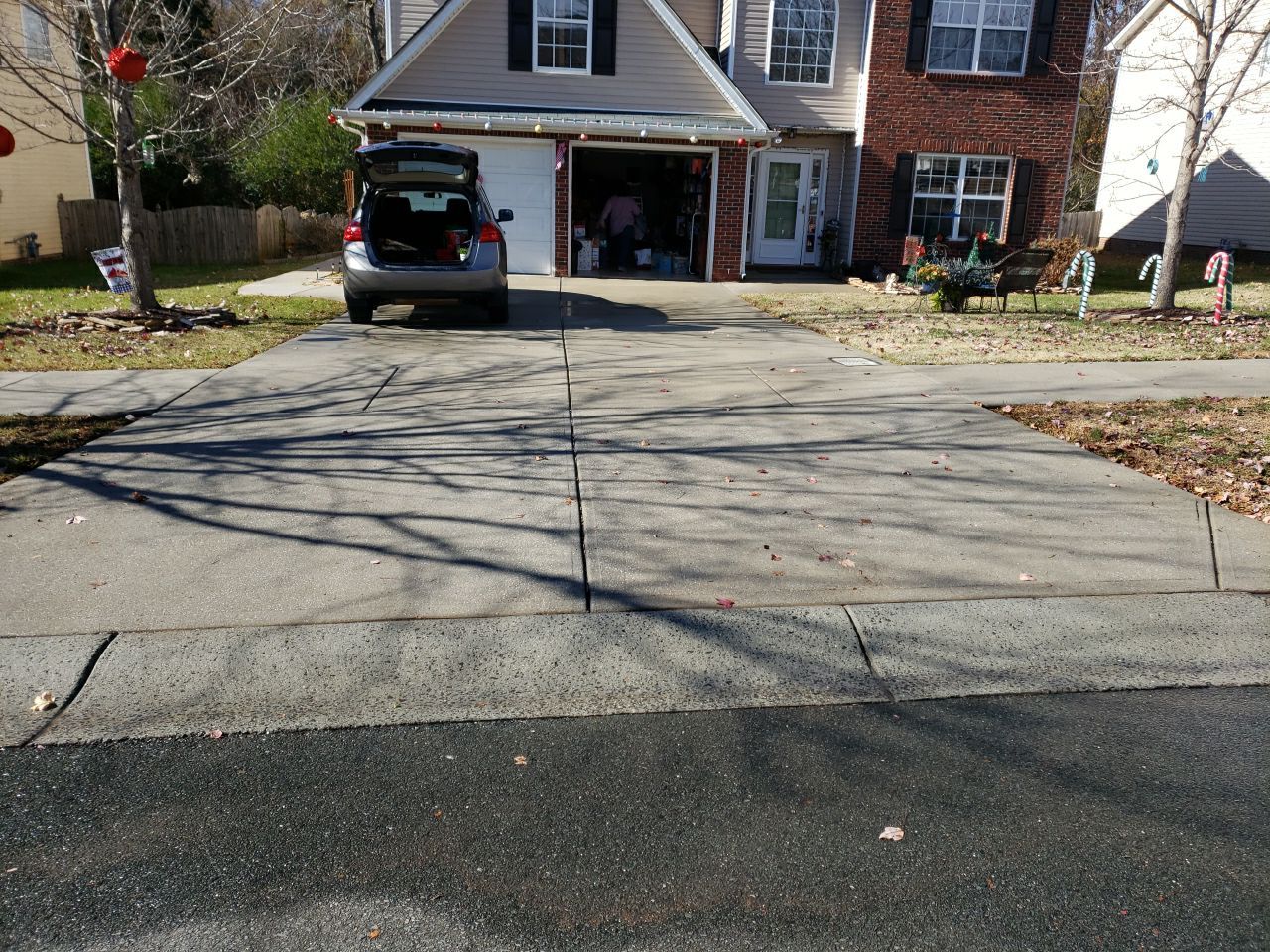 gutters and Driveway by Power Wash Masters LLC