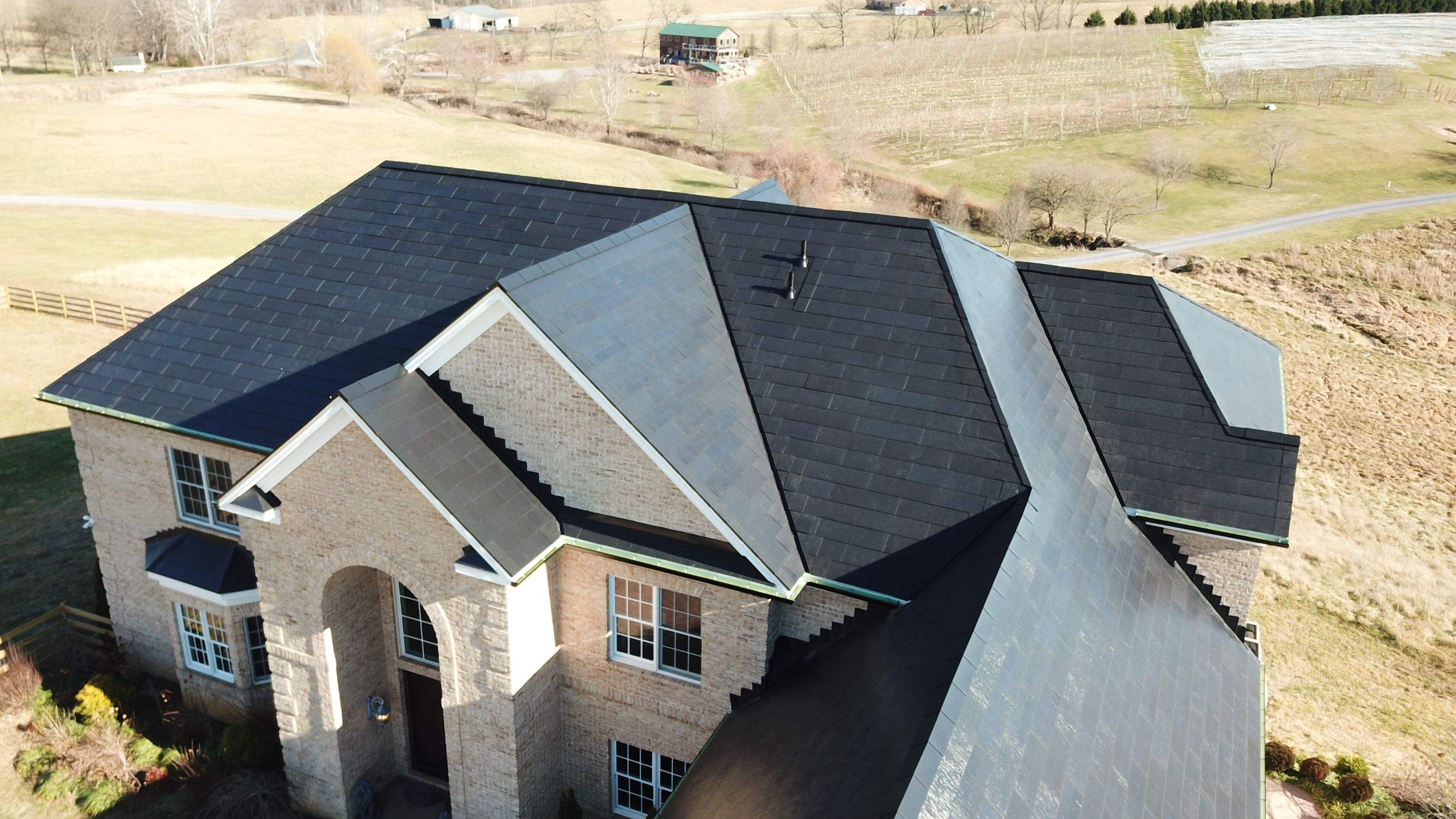 Tesla Solar Roof Replacement by American Home Contractors