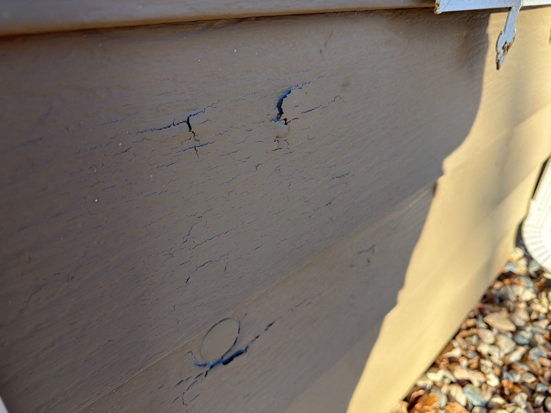 Exterior Siding Repair and Full House Repaint in Sioux Falls by Select Painting, Coatings & Garage Cabinets
