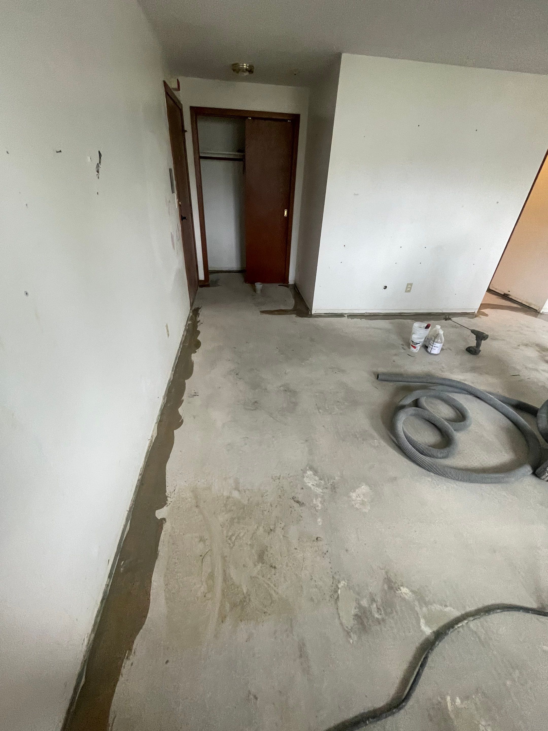 Commercial Subfloor Preparation and Flooring Restoration in Sioux Falls by Select Painting, Coatings & Garage Cabinets