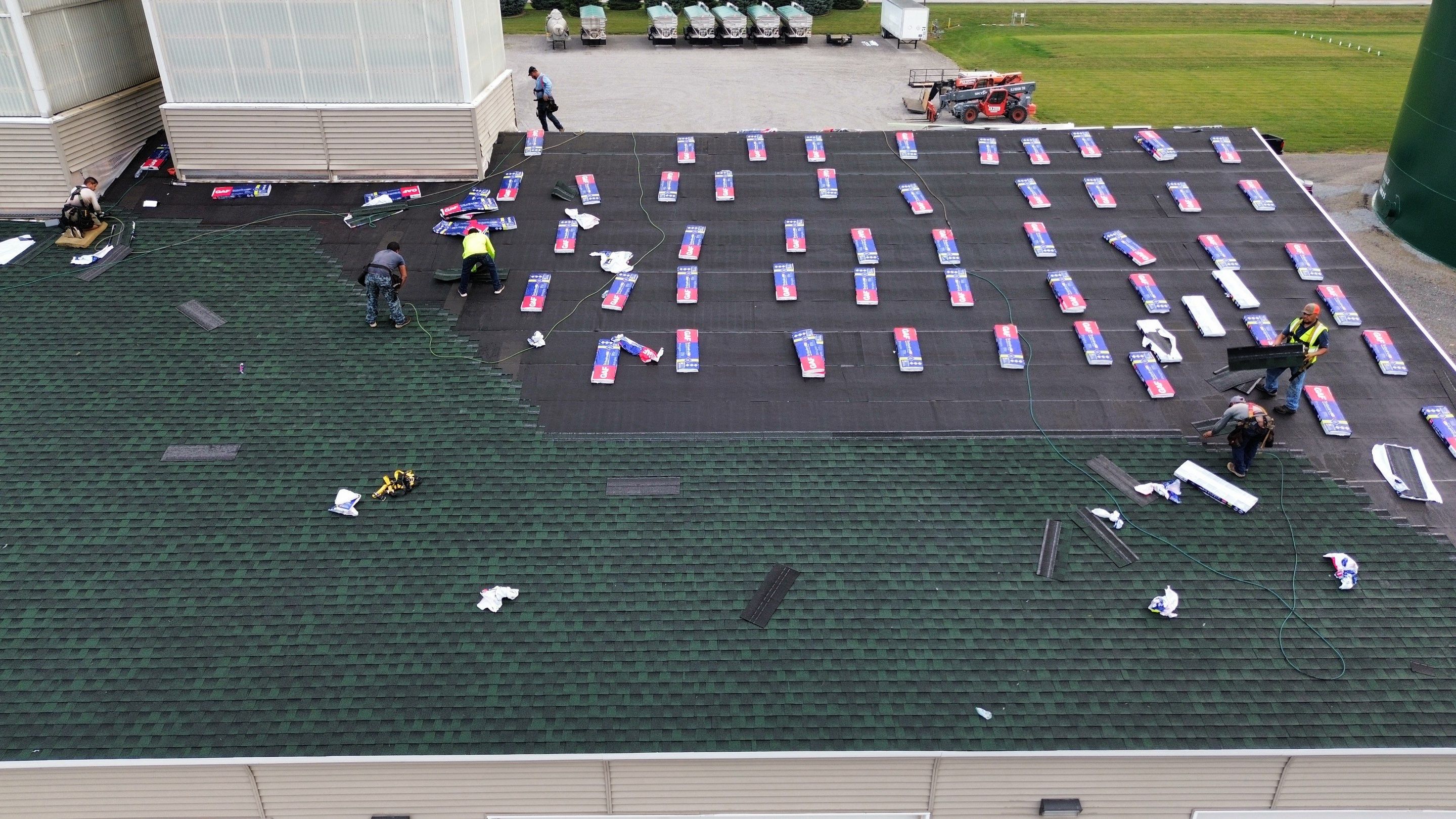 Commercial Roofing Installation using Timberline HDZ Shingles - Hunter Green by RoofX 