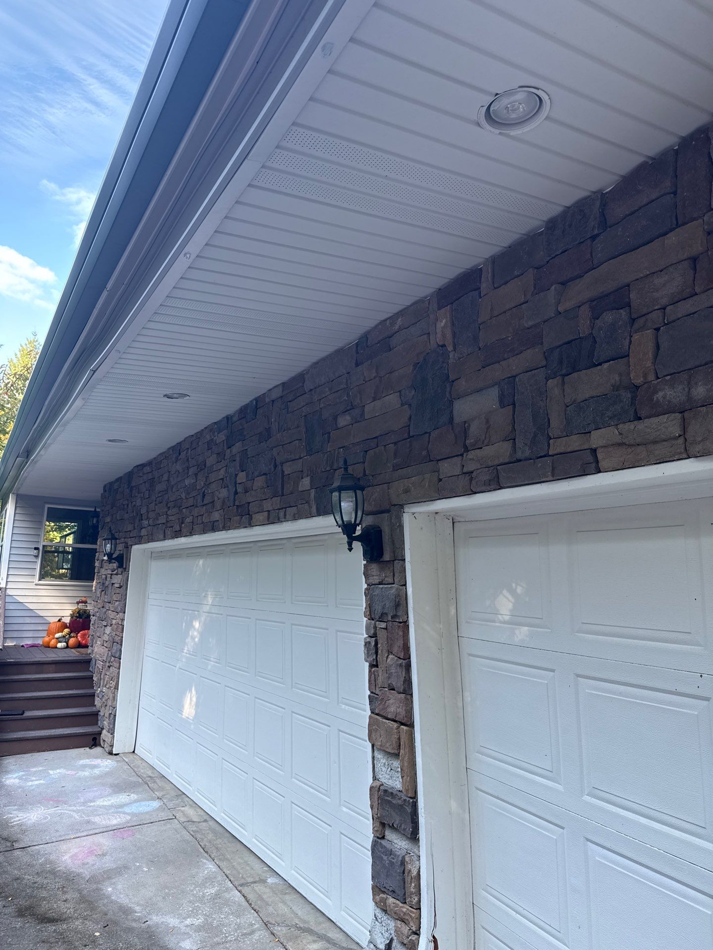 Damascus Garage Exterior Repair and Stacked Stone Veneer Installation by American Made Construction 