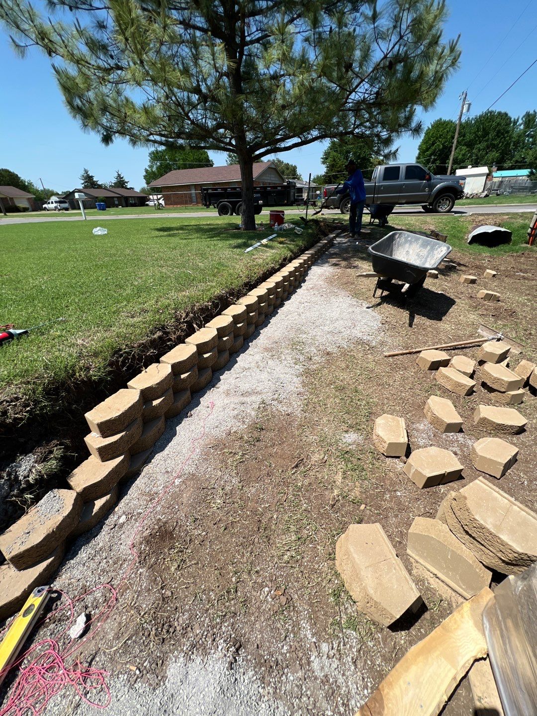 Retaining Wall using Rocks by Clays Services Inc