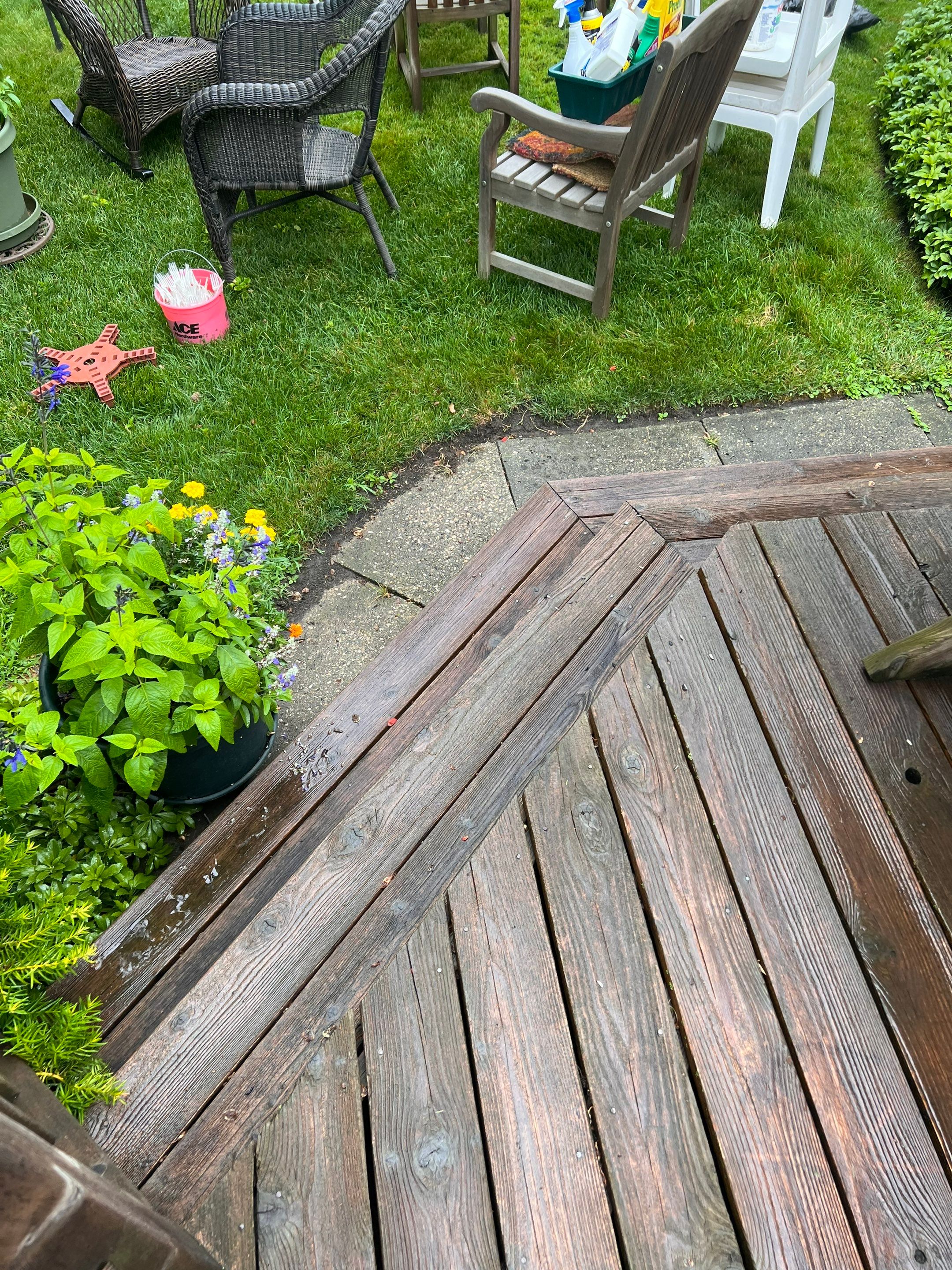 Wood deck cleaning, board replacement and staining by Northern Power Washing LLC.