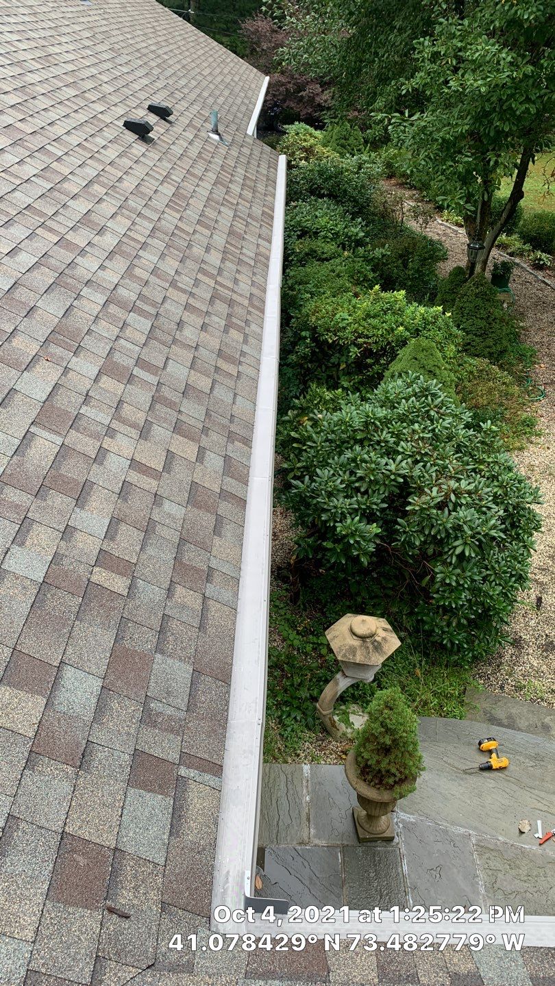 Commercial Roofing Installation using Owens Corning Duration Driftwood by A Plus Exterior