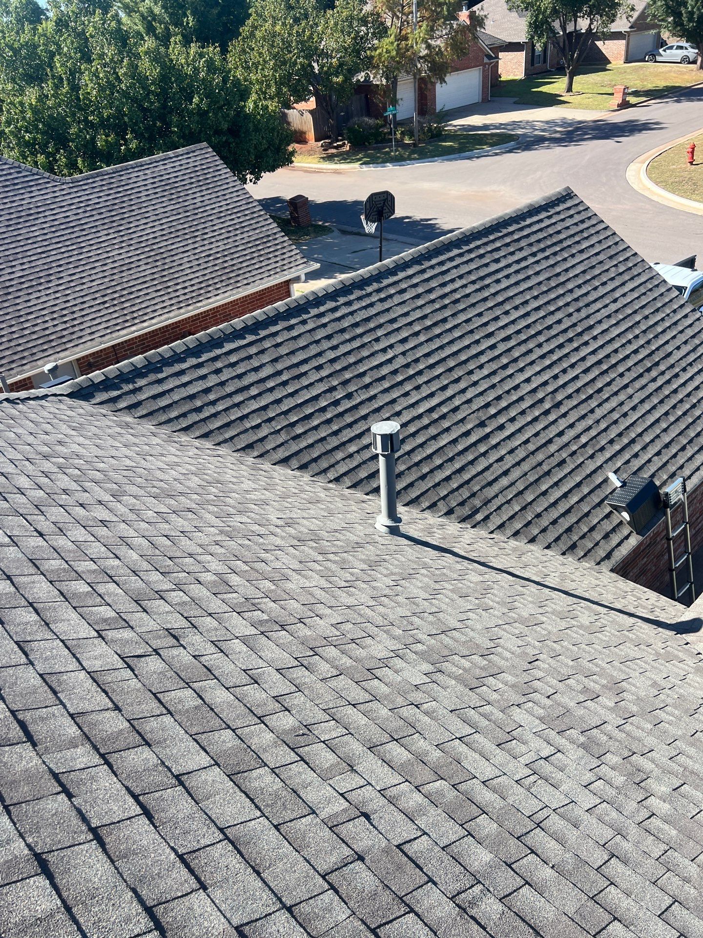 Roof Replacement and Gutter Installment in Edmond, OK by McCann's Roofing and Construction