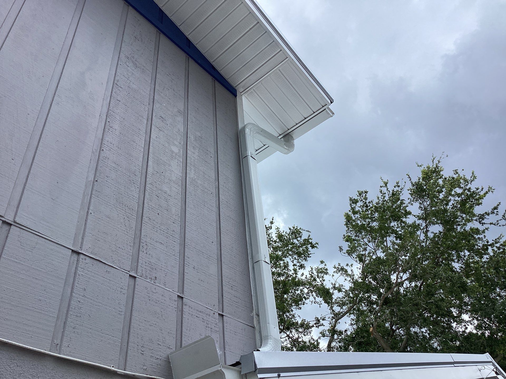 White K Style Seamless Gutters using 3X4 Elbow Downspout in Sarasota FL by Gutter Professors