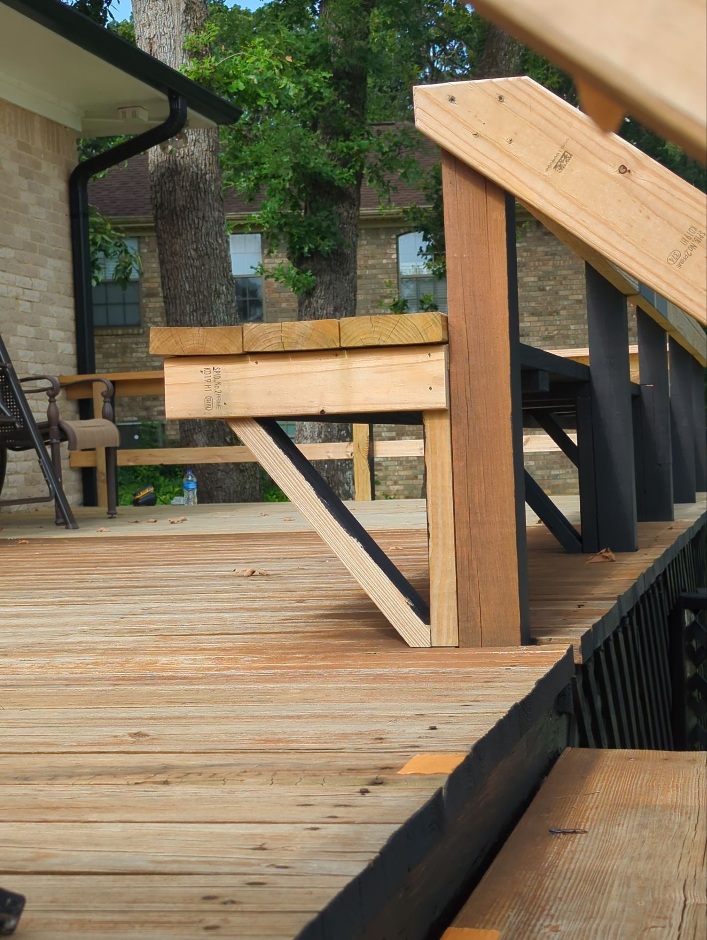 Lake House Deck Restaining in Flint, Texas by Quality Coats Painting